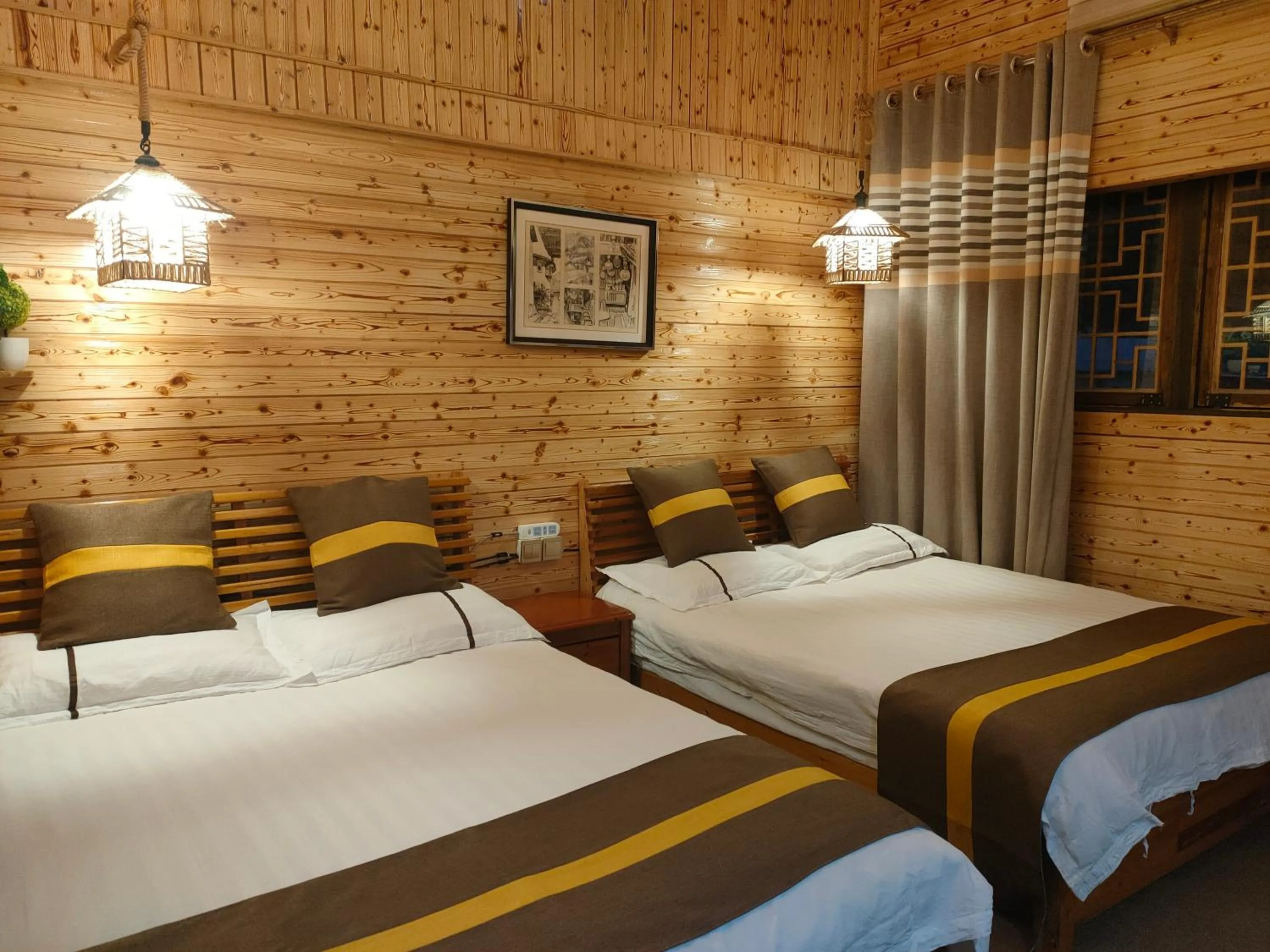 Bed in Nanjing Tulou Qingdelou Inn