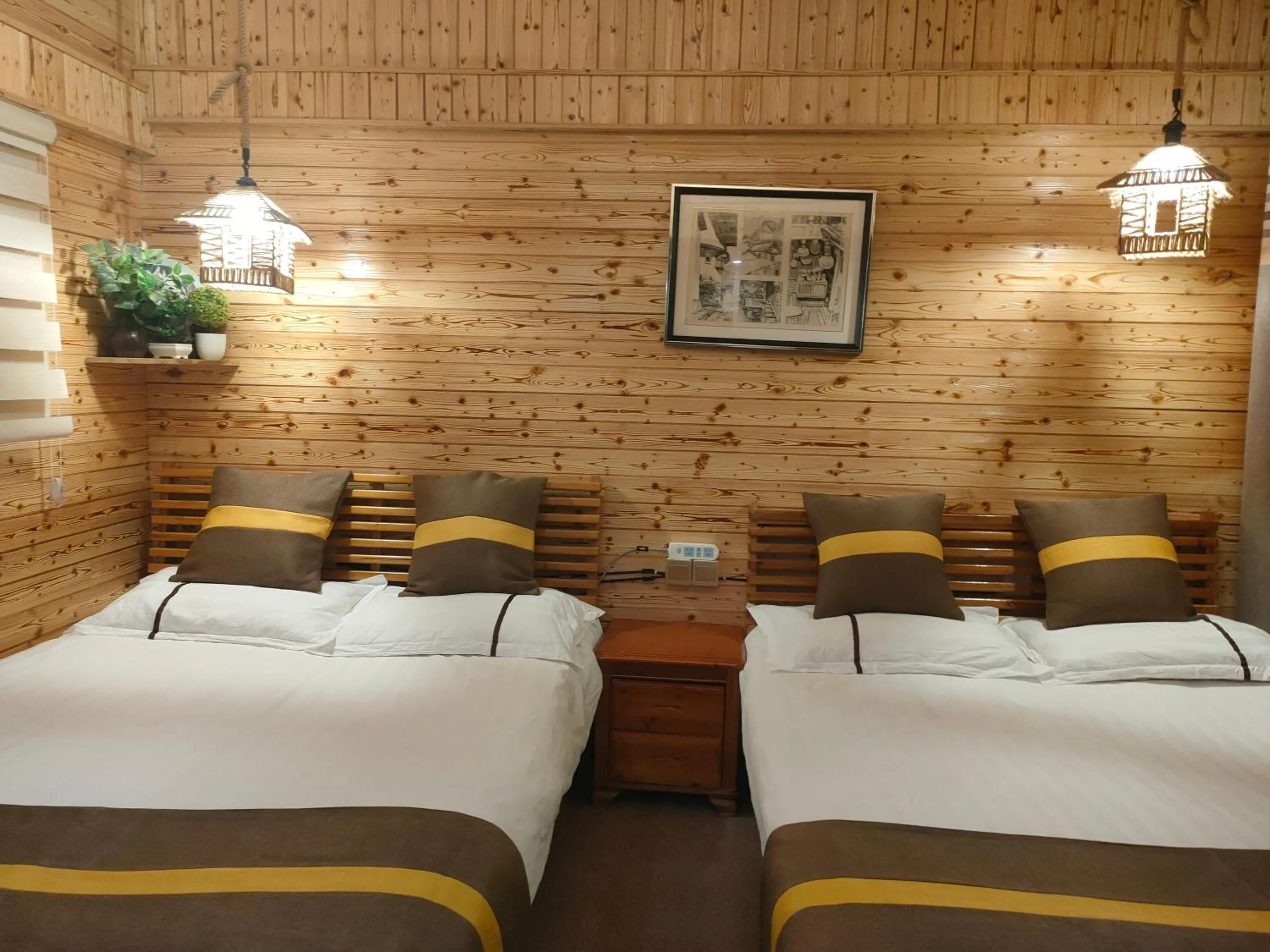 Bed in Nanjing Tulou Qingdelou Inn