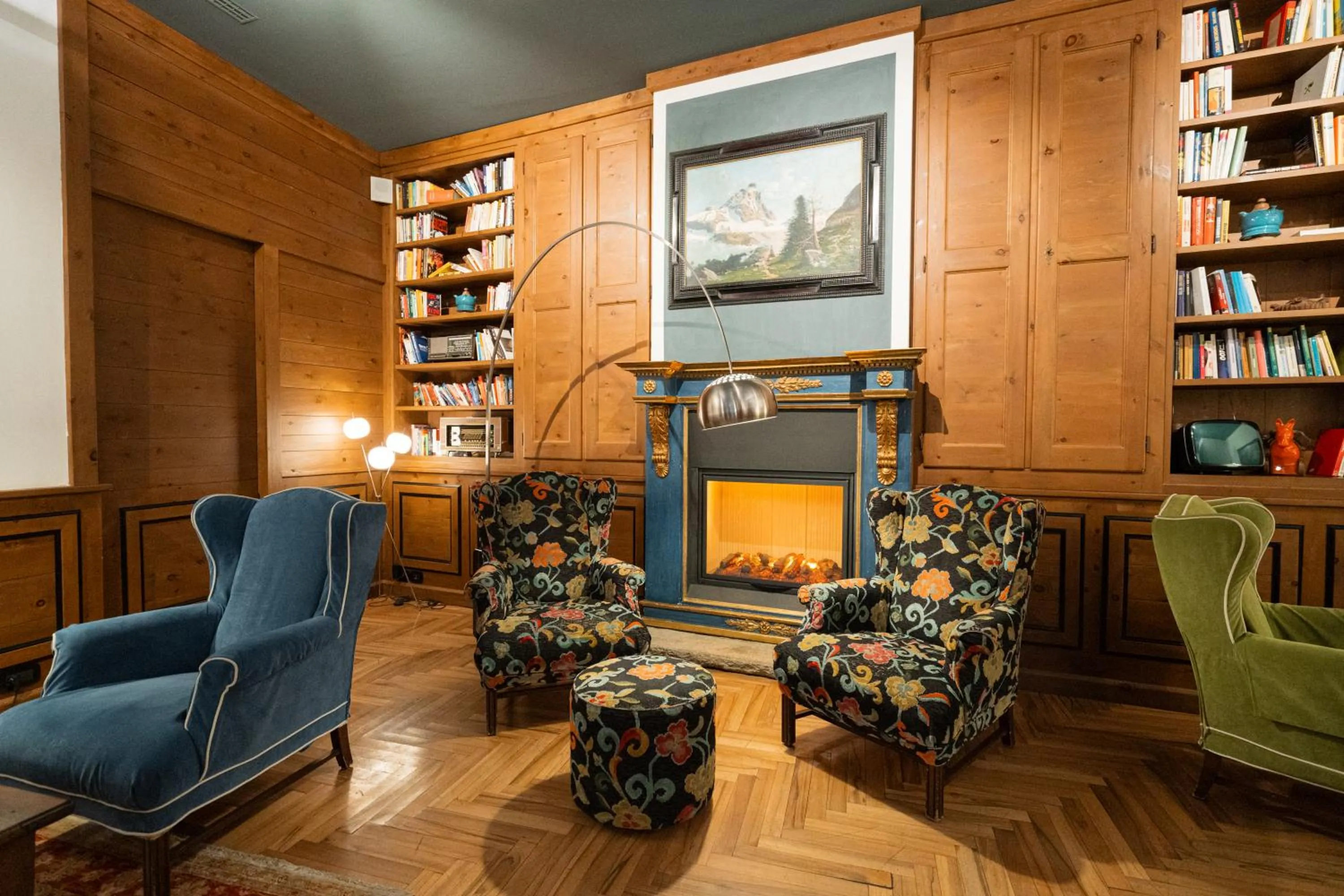 Communal lounge/ TV room in Duca D'Aosta Hotel