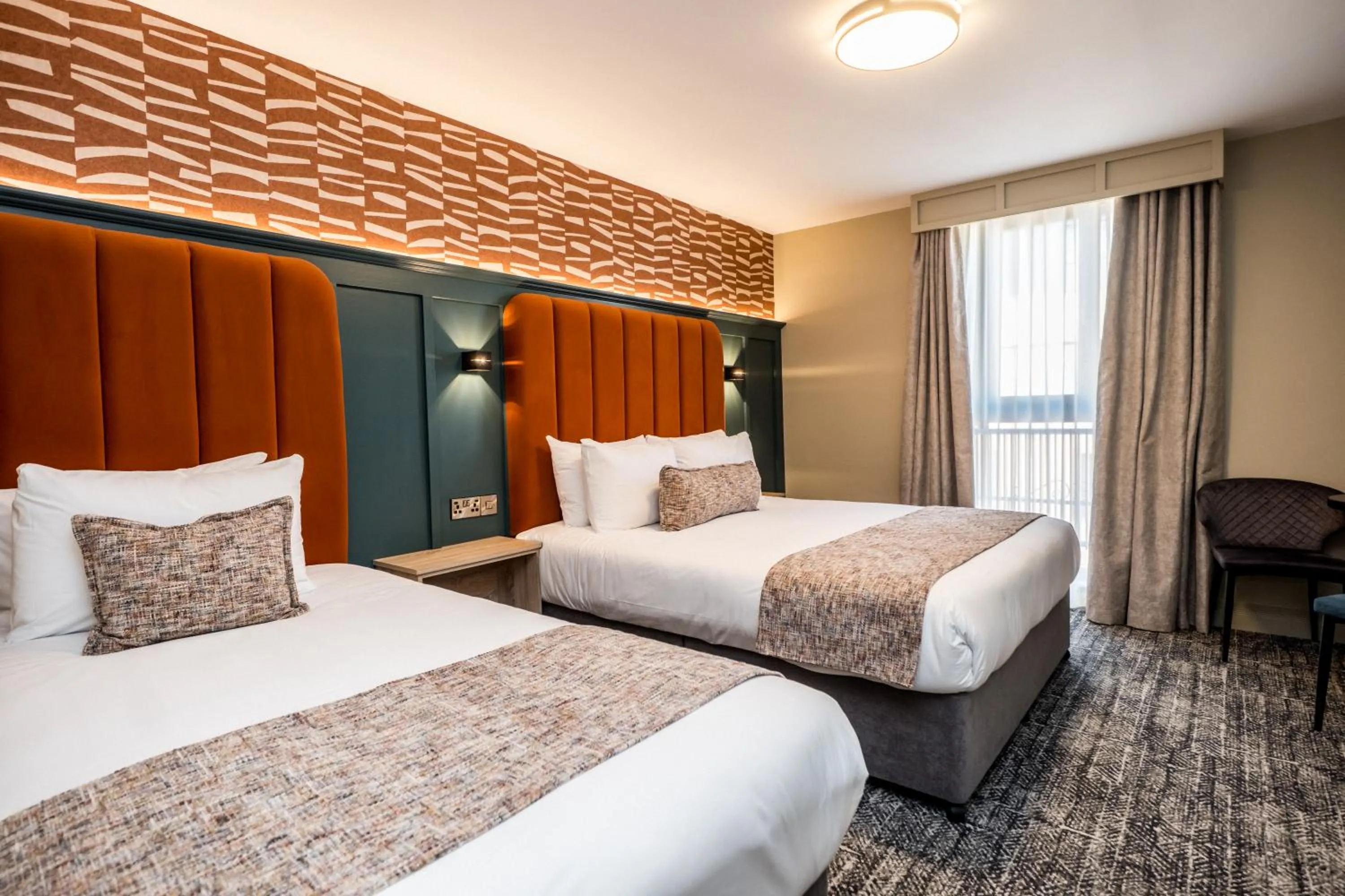 Bed in The Maiden City Hotel