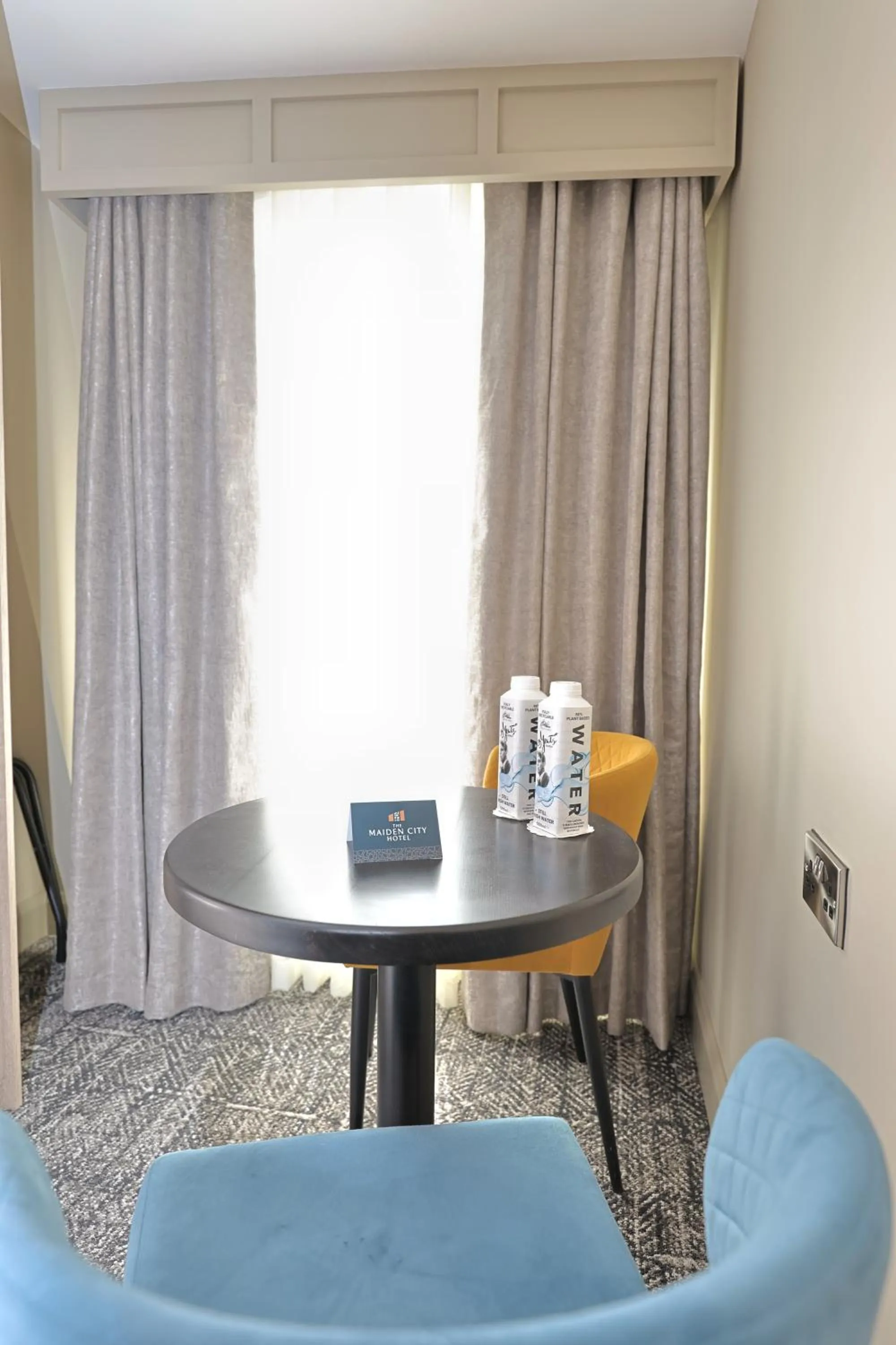 Seating area in The Maiden City Hotel