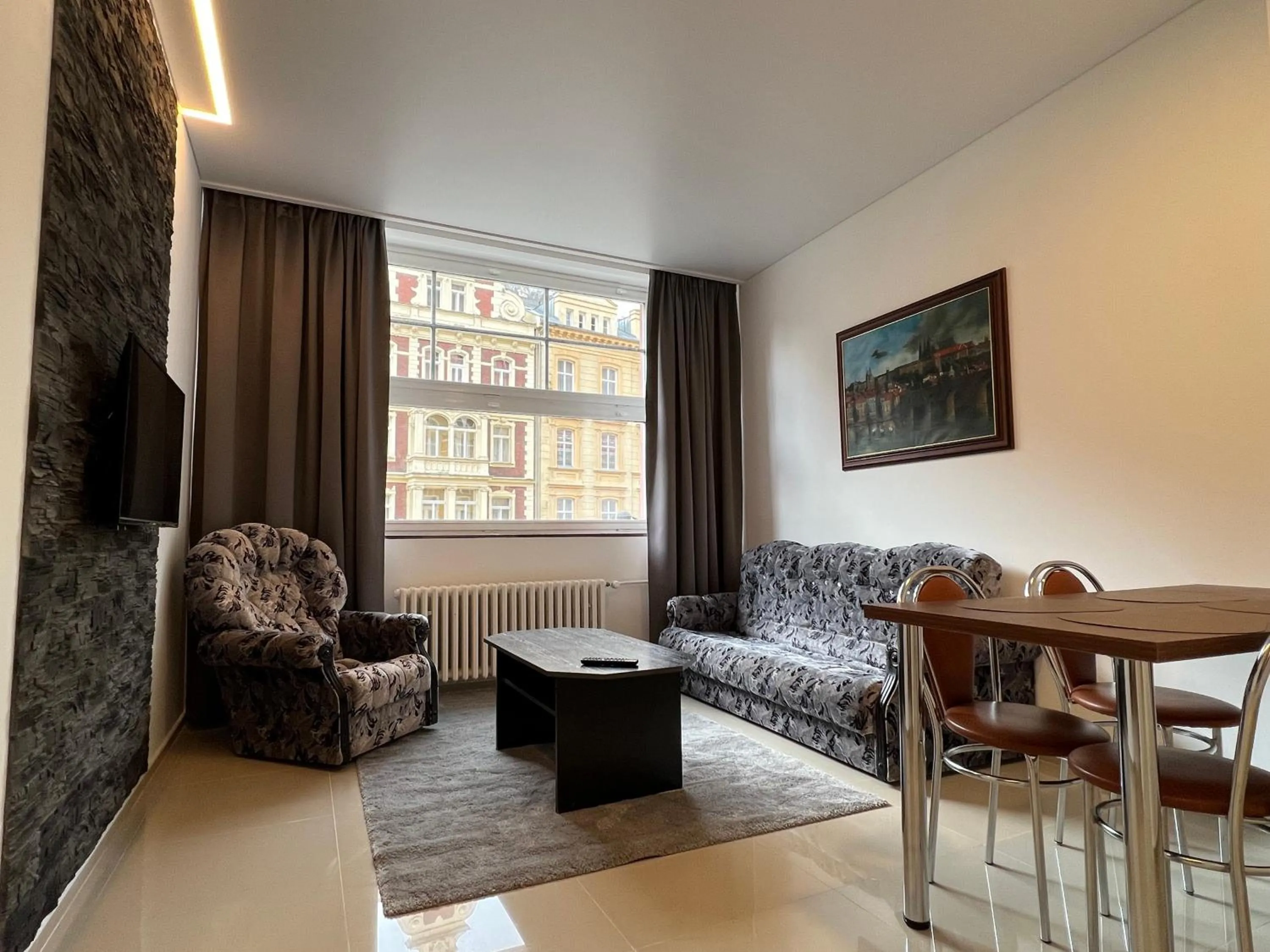 Communal lounge/ TV room in Madonna Apartments