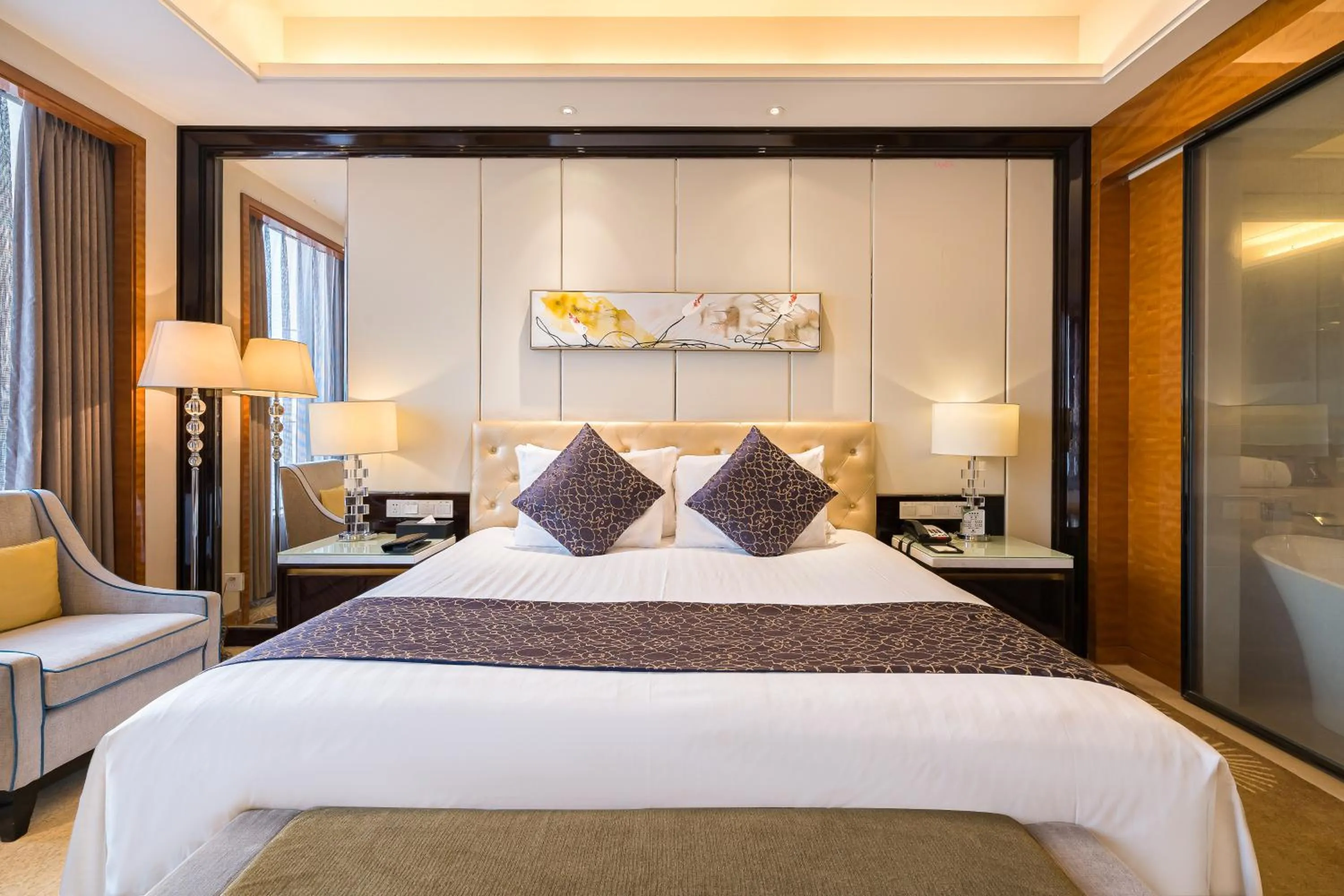 Bed in New Century Grand Hotel Siyang