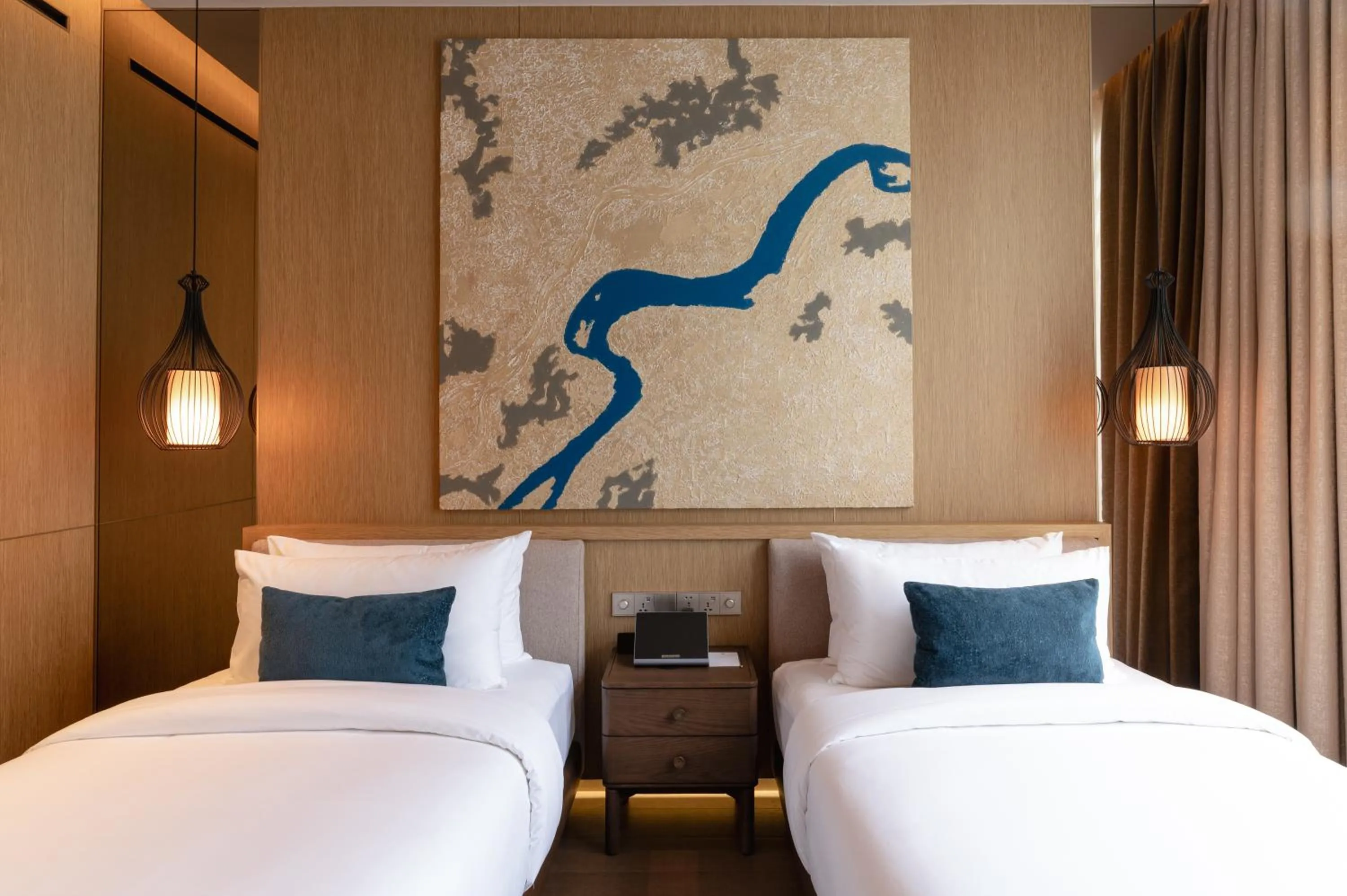 Bed in SOMA HOTEL Riverside