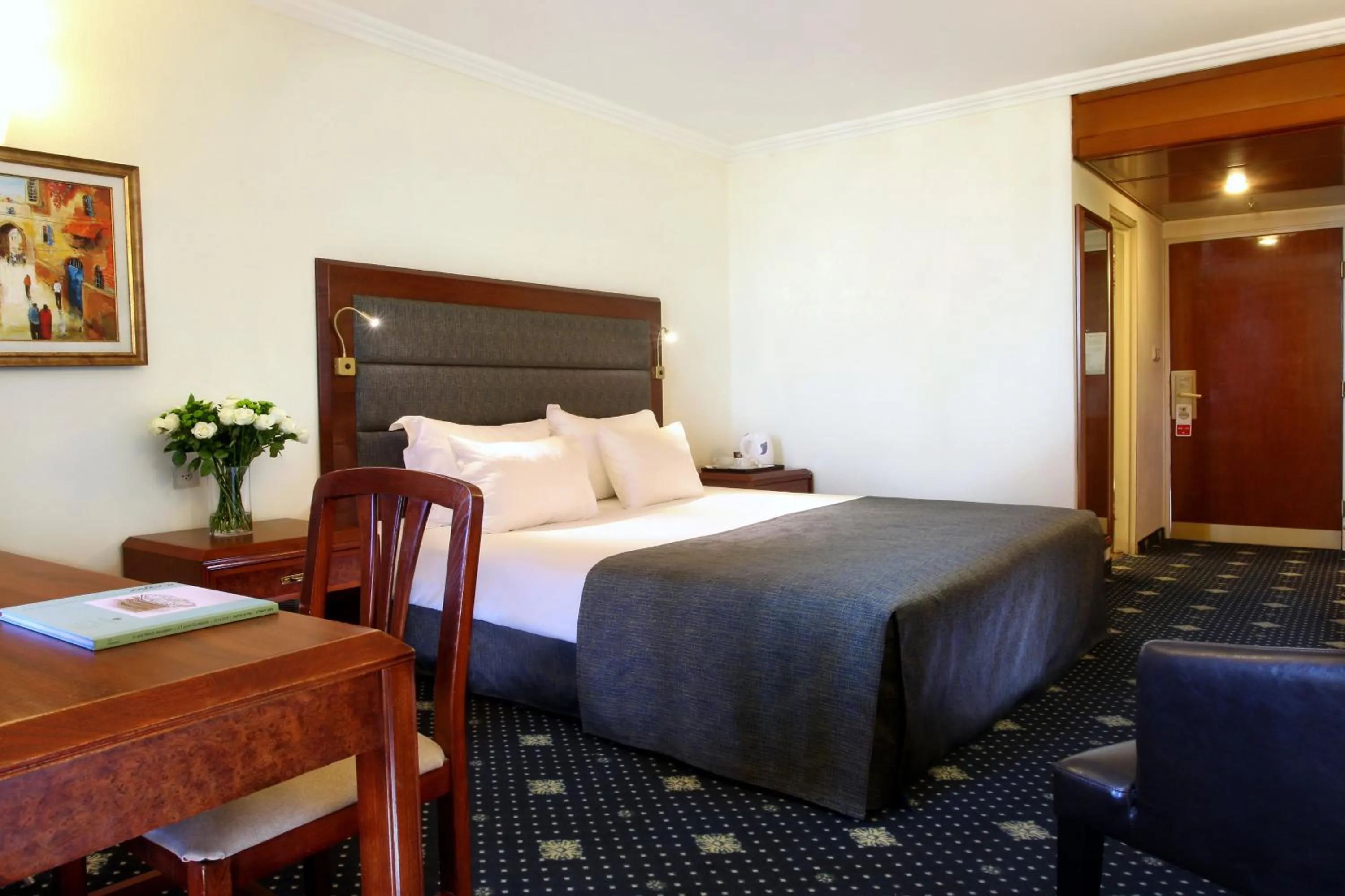 Seating area, Bed in Ramada Jerusalem Hotel