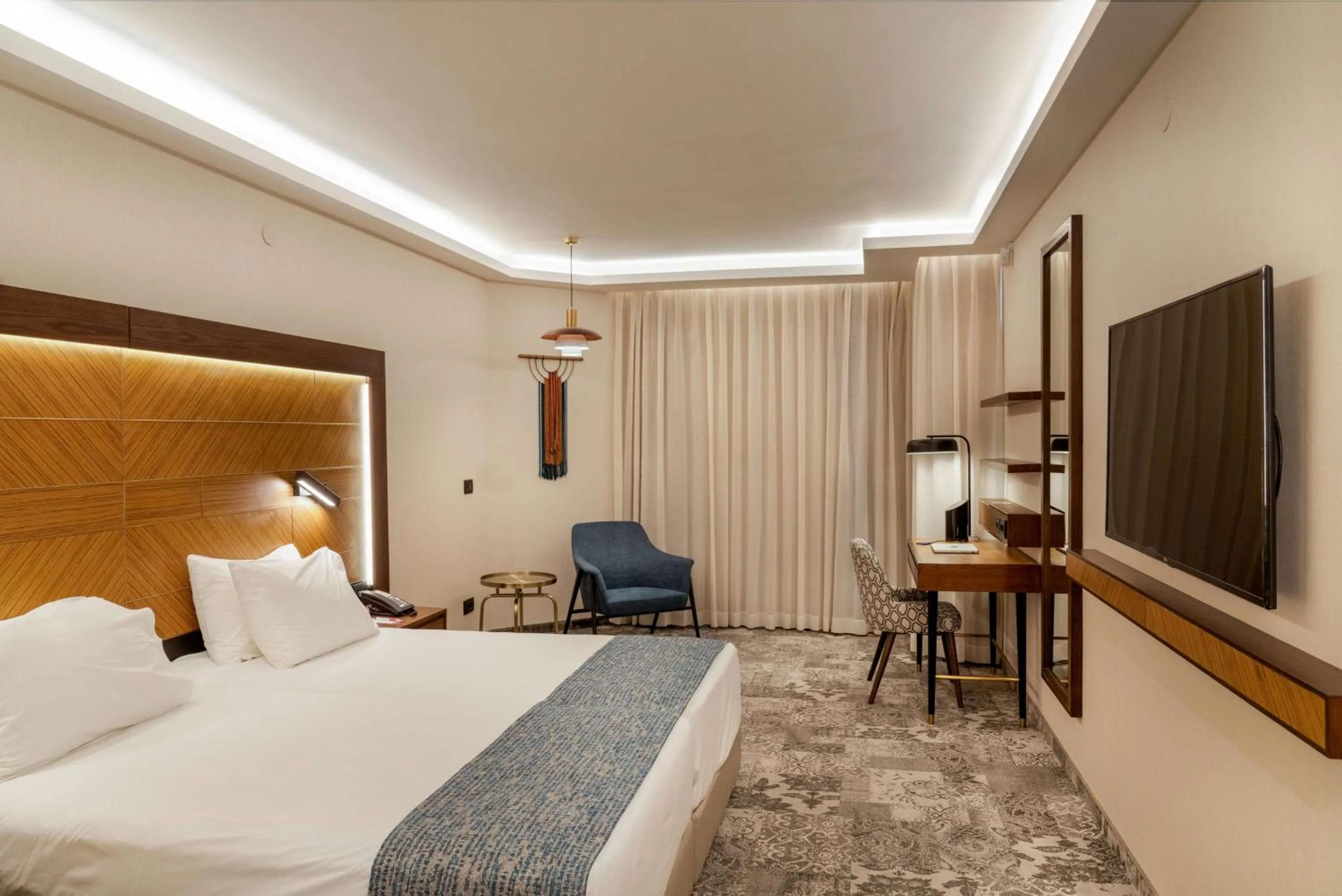 Bed in Ramada Jerusalem Hotel