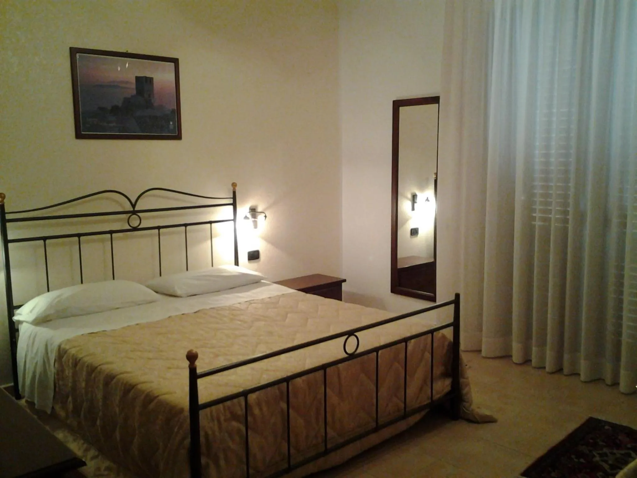 Photo of the whole room, Bed in History Hotel