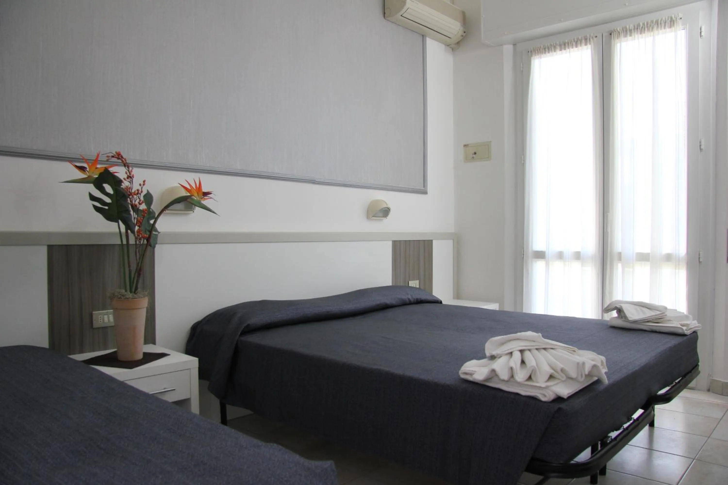 Bedroom in Hotel Costanza