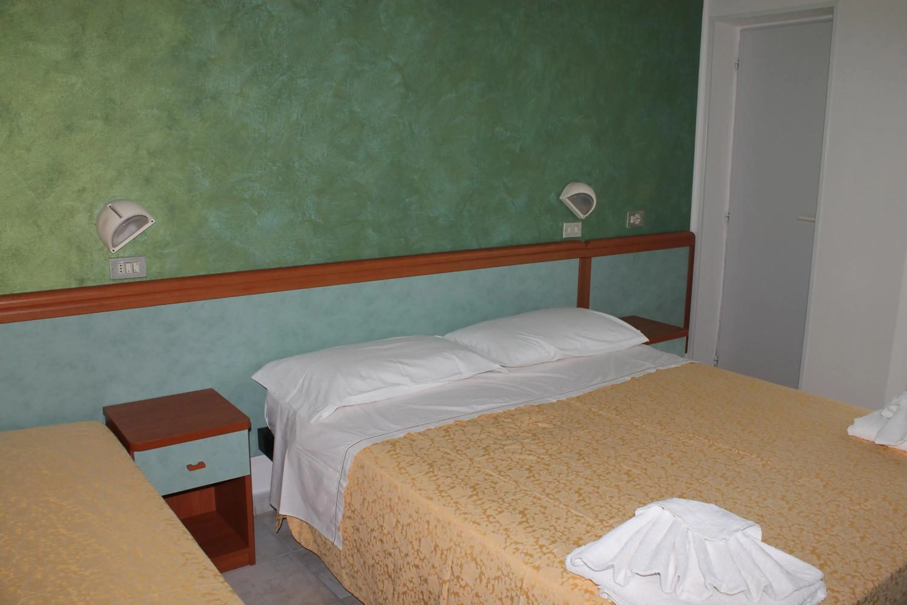 Bedroom in Hotel Costanza