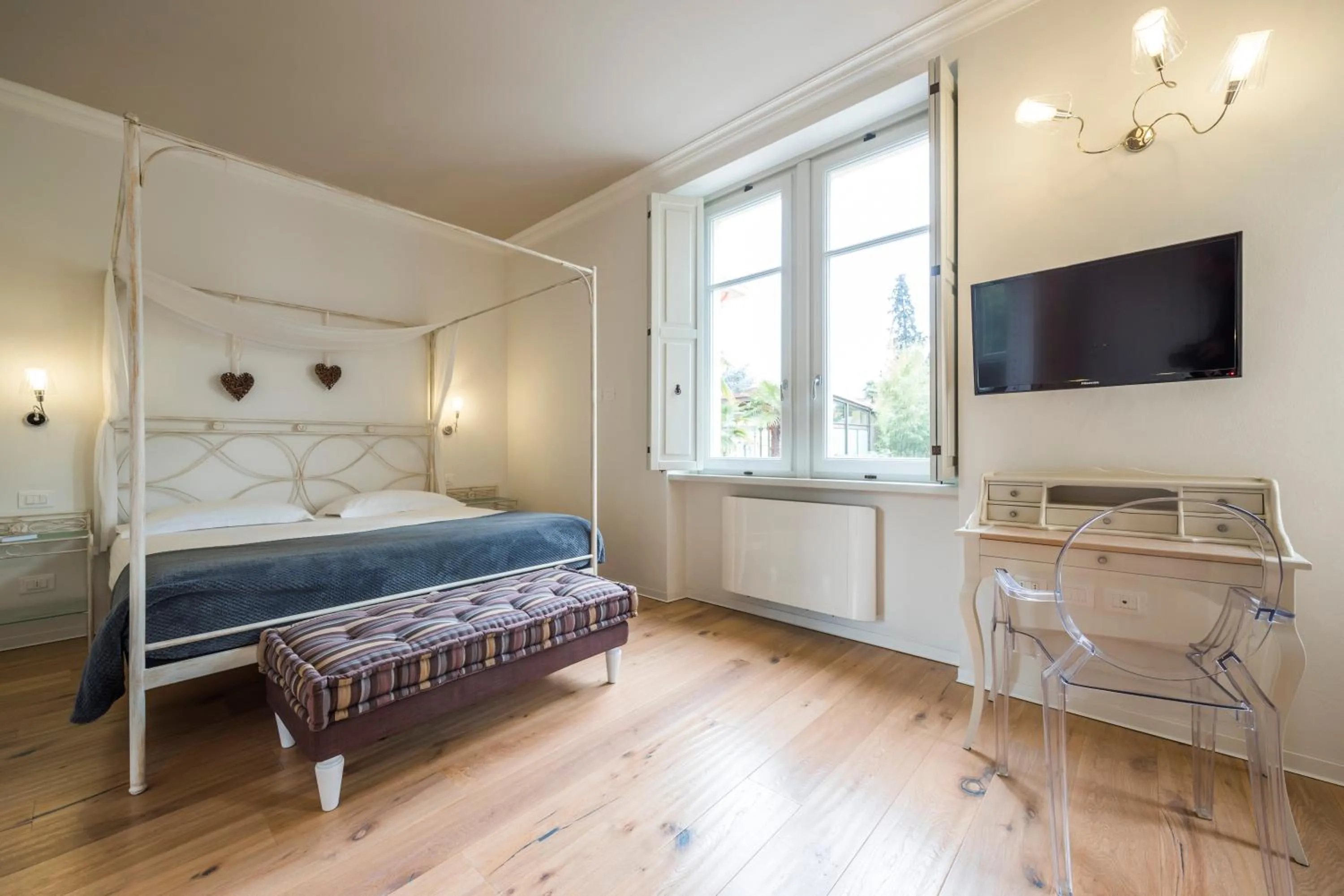 Bed in Villa Italia Luxury Suites and Apartments