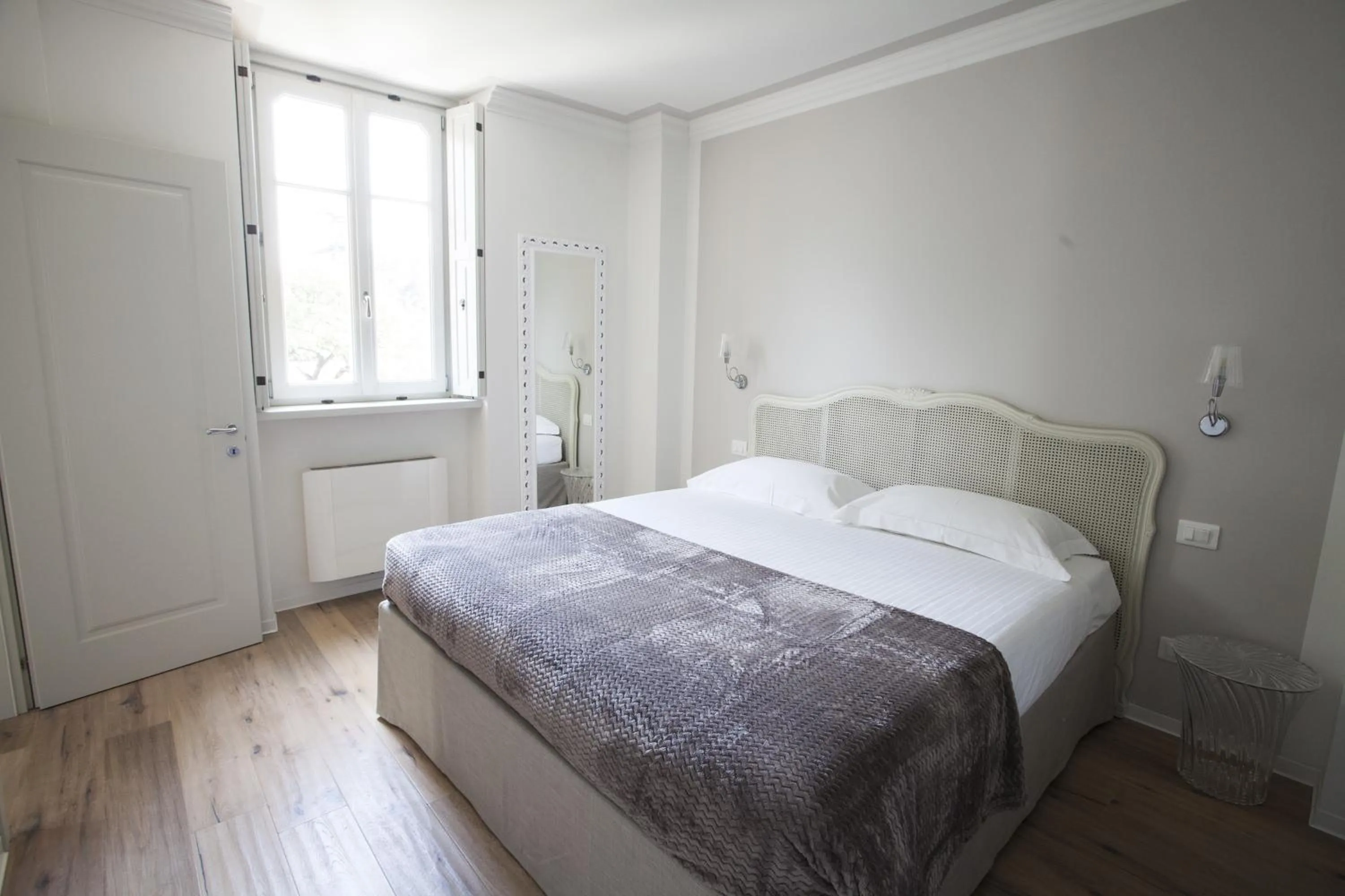 Bed in Villa Italia Luxury Suites and Apartments