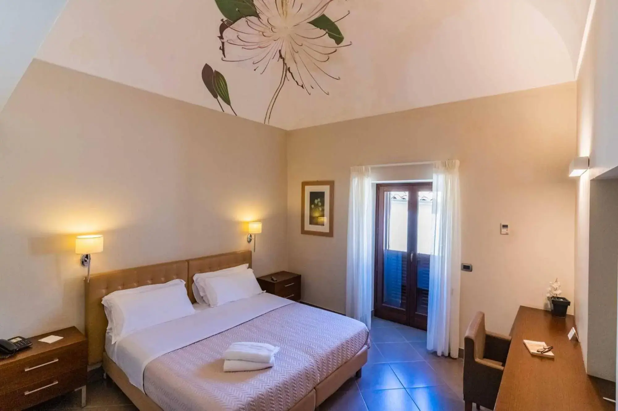 Double Room Single Use - single occupancy in Le Magnolie Hotel Double Room Single Use - single occupancy in Le Magnolie Hotel