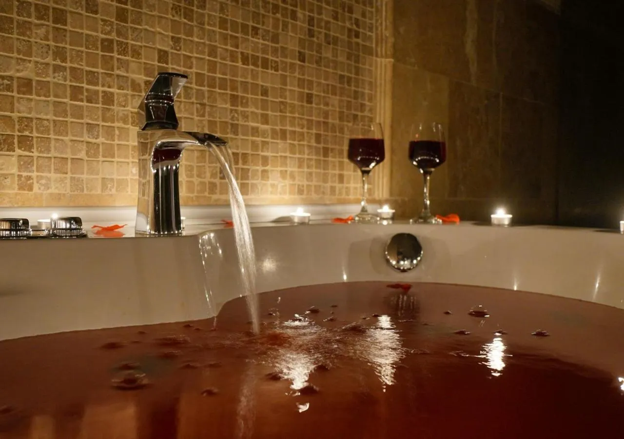 Hot Tub in ShoeString Stone House