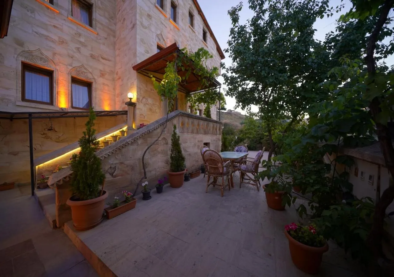 Facade/entrance in ShoeString Stone House