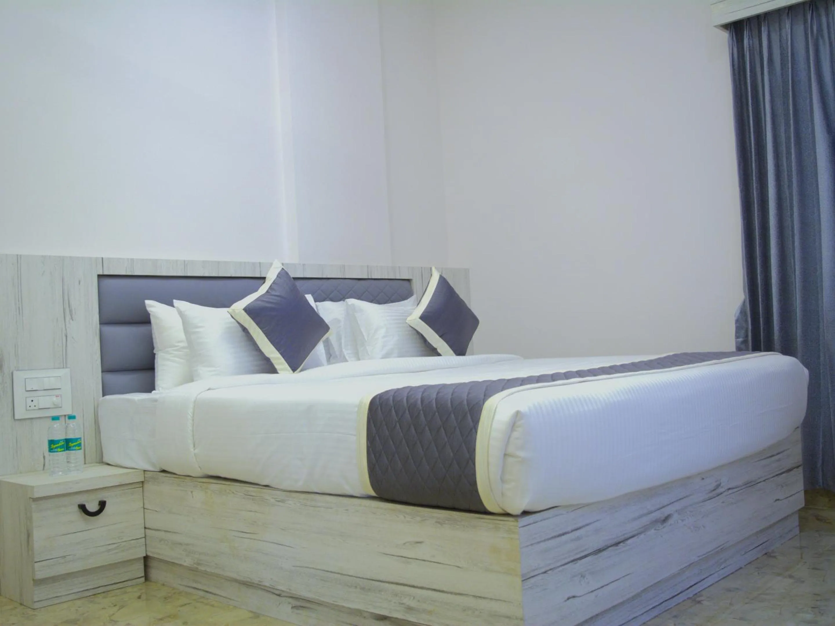 Bed in City Service Apartment