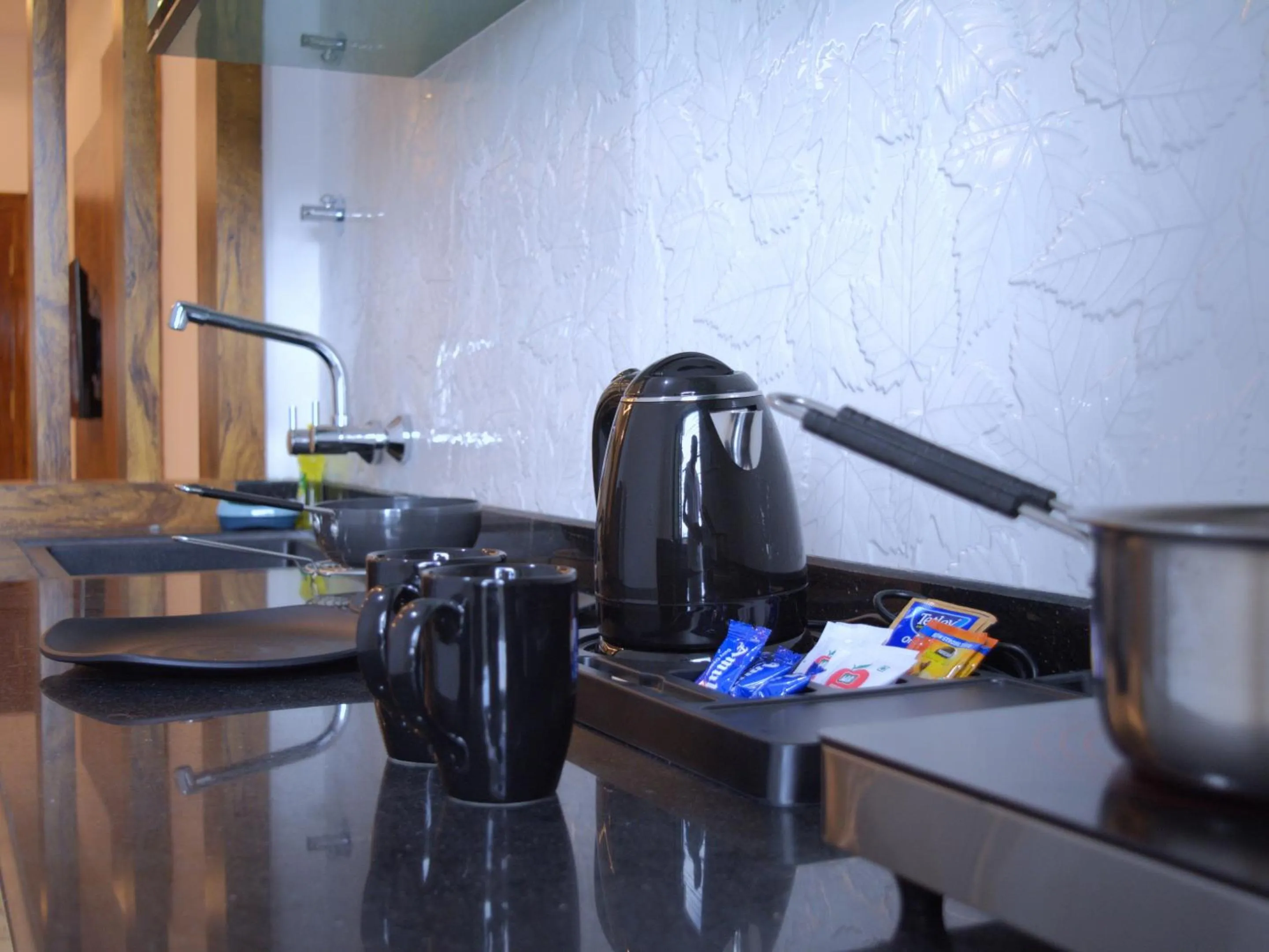 Kitchen or kitchenette in City Service Apartment