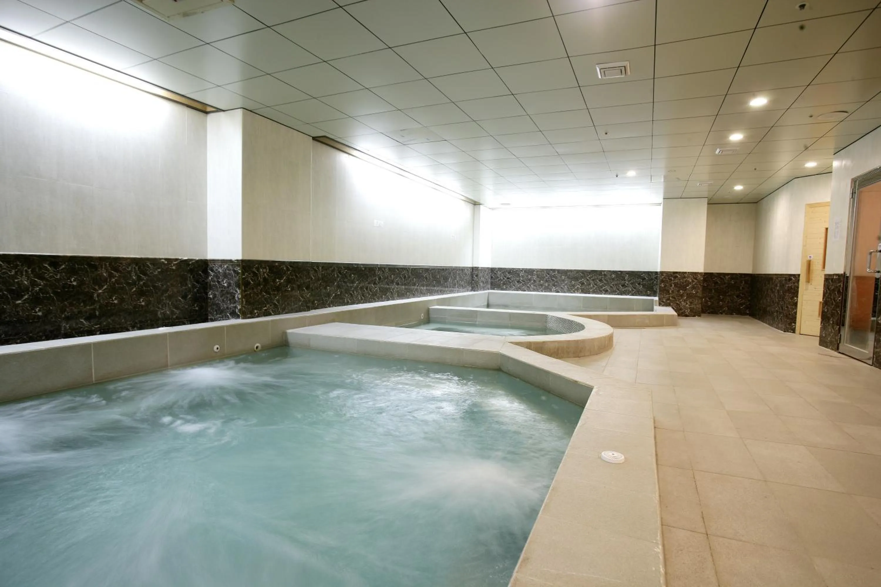 Swimming pool in Le Beau Max Resort