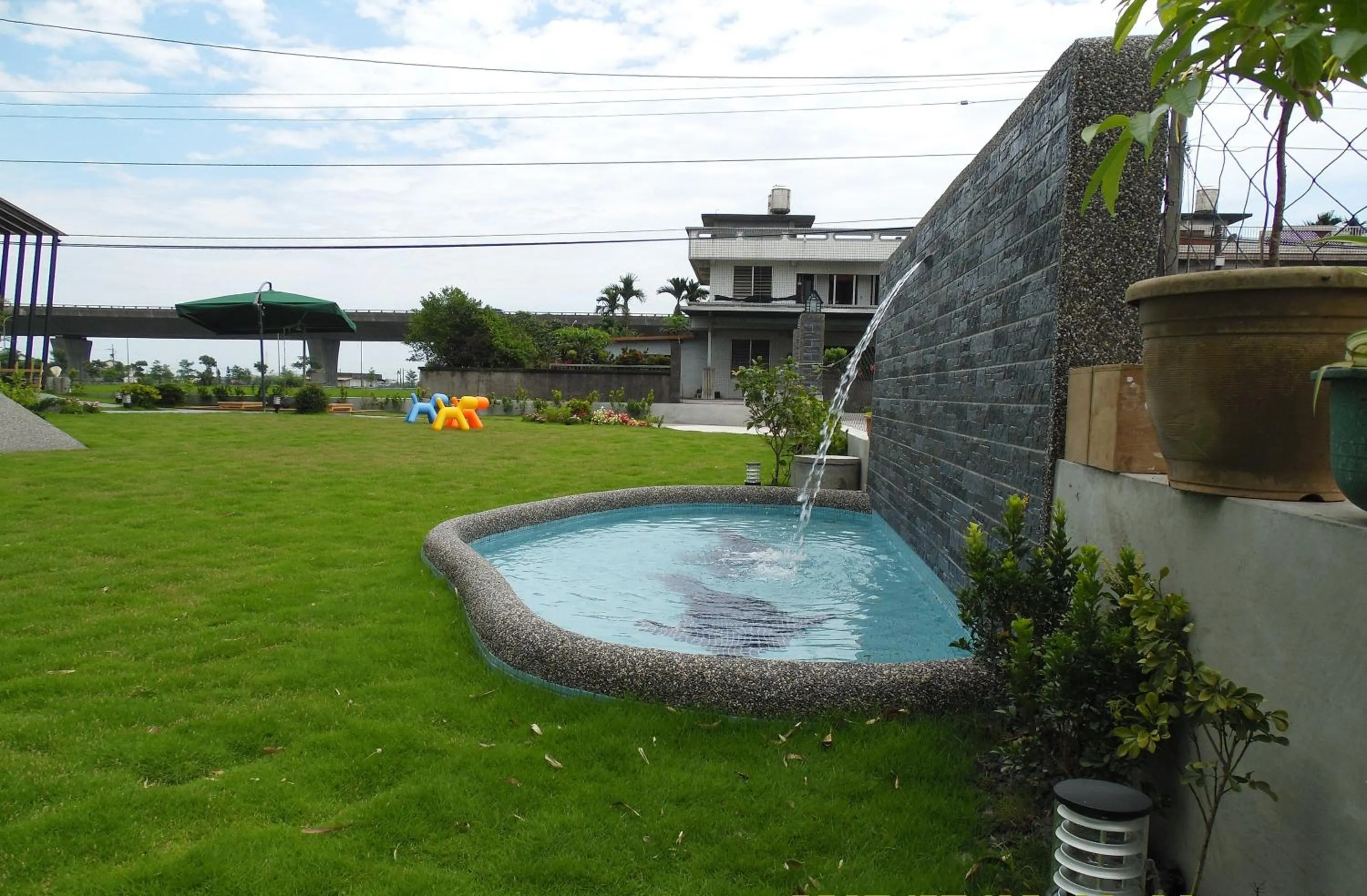 Swimming pool in Footprint Garden B&B