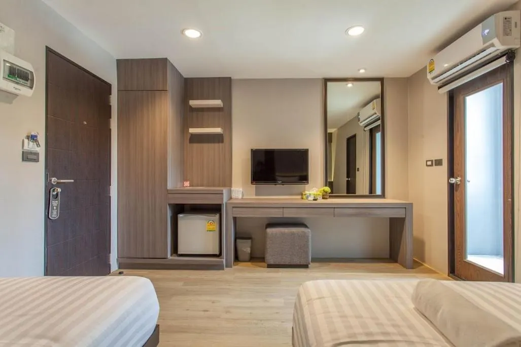 Bed in Kesorn Boutique Hotel