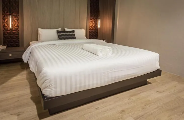 Bed in Kesorn Boutique Hotel