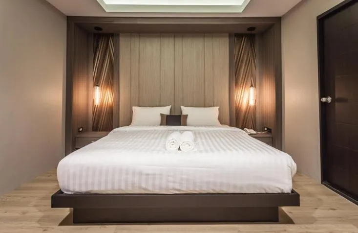 Bed in Kesorn Boutique Hotel