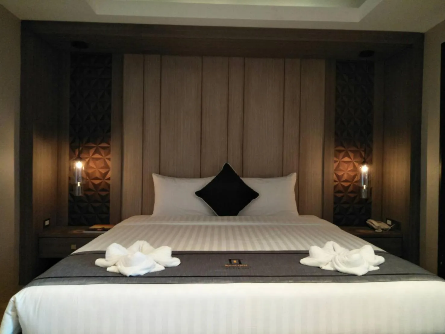 Bed in Kesorn Boutique Hotel