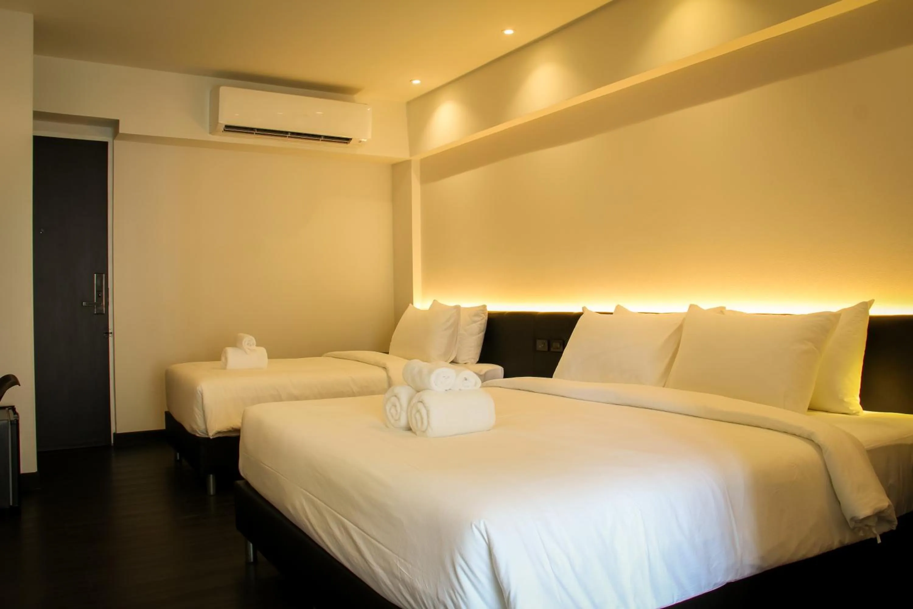 Bed in iThaphae Hotel