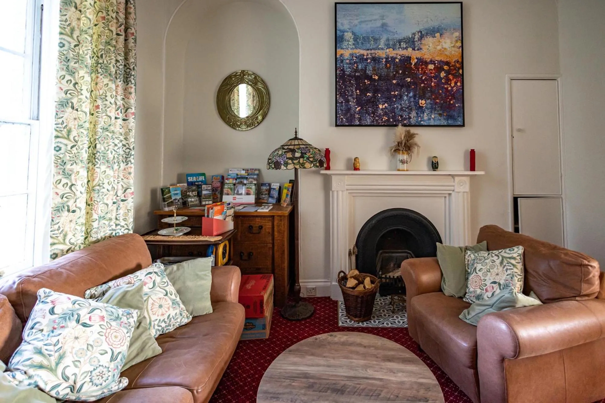 Communal lounge/ TV room in Gresham Guest House