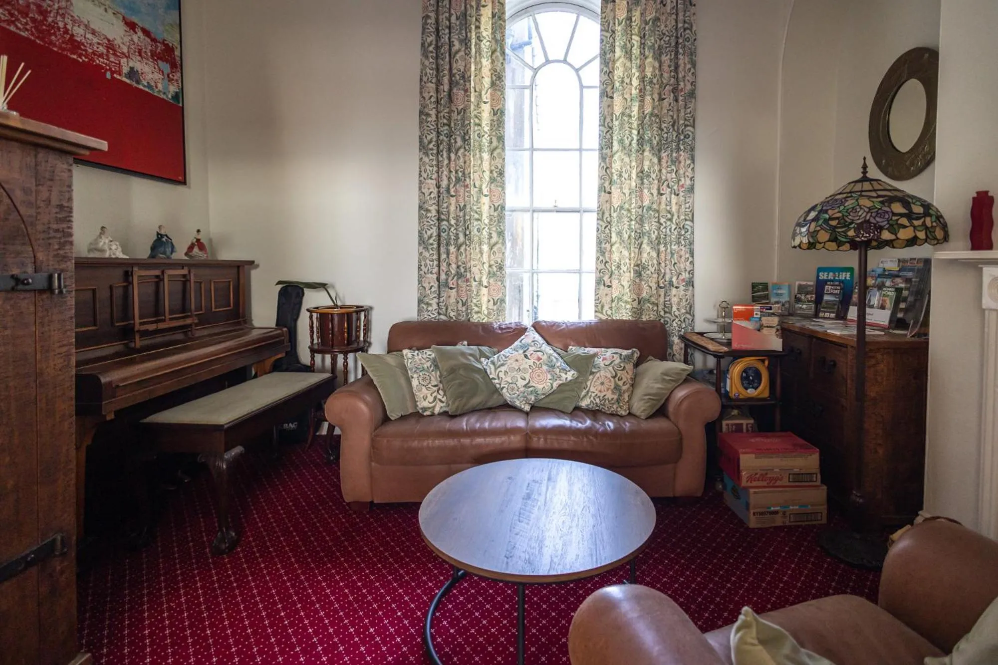 Communal lounge/ TV room in Gresham Guest House