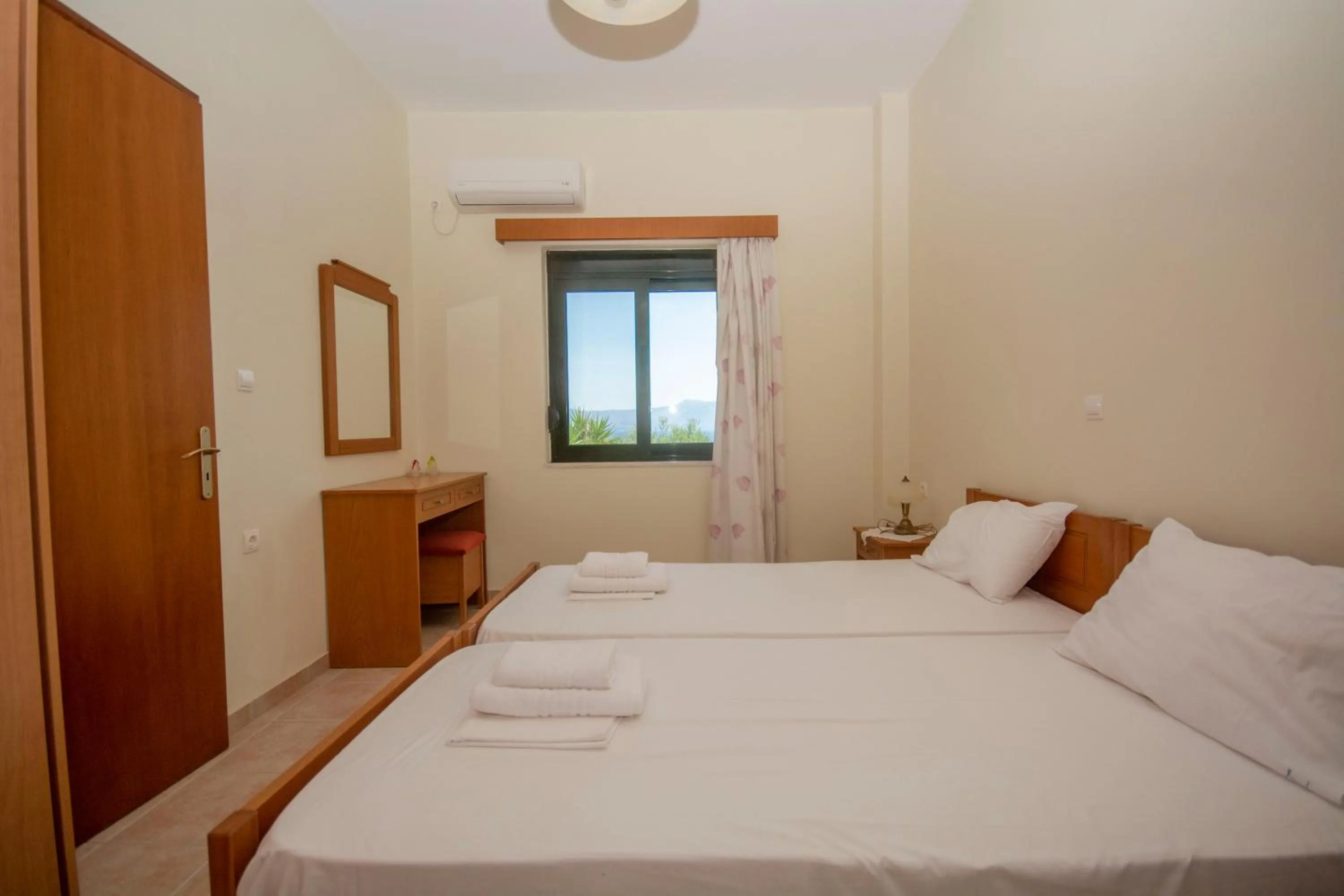 Bed in Xenios Zeus Apartments