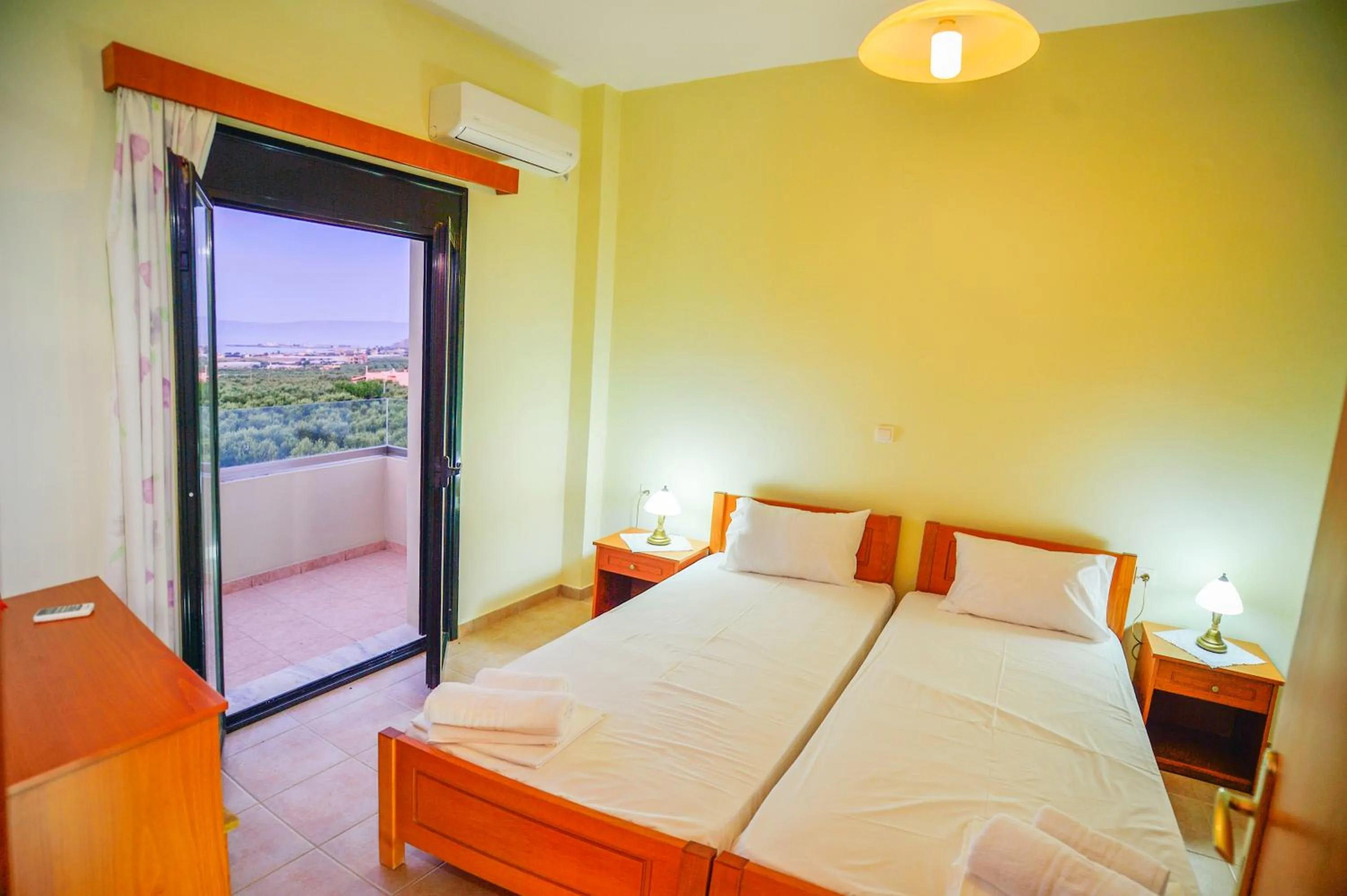 Bed in Xenios Zeus Apartments