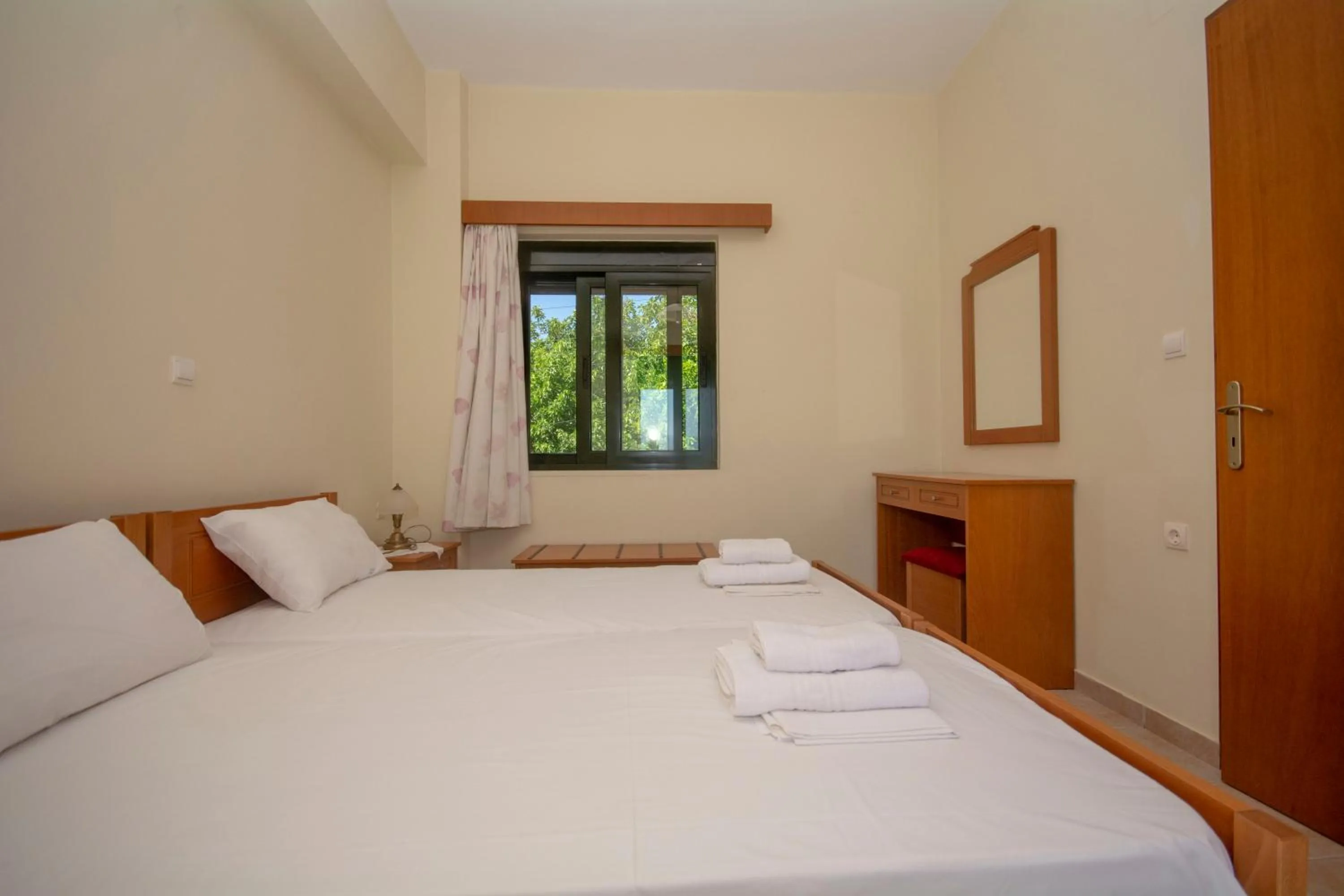 Bed in Xenios Zeus Apartments