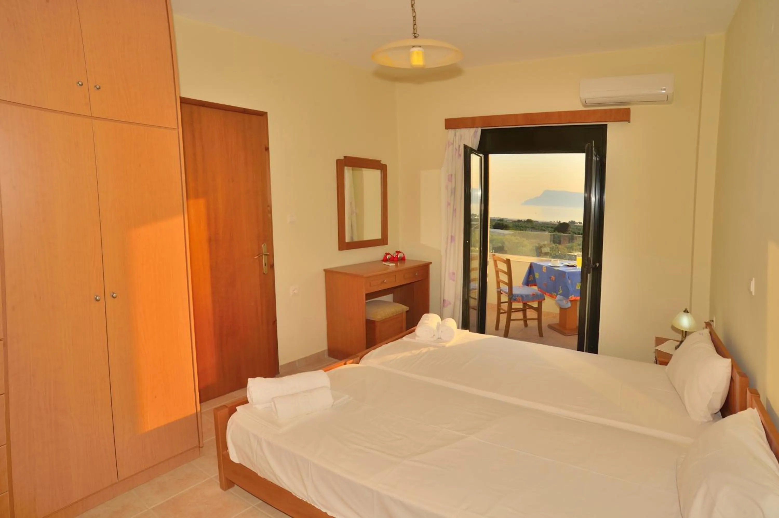 Bed in Xenios Zeus Apartments