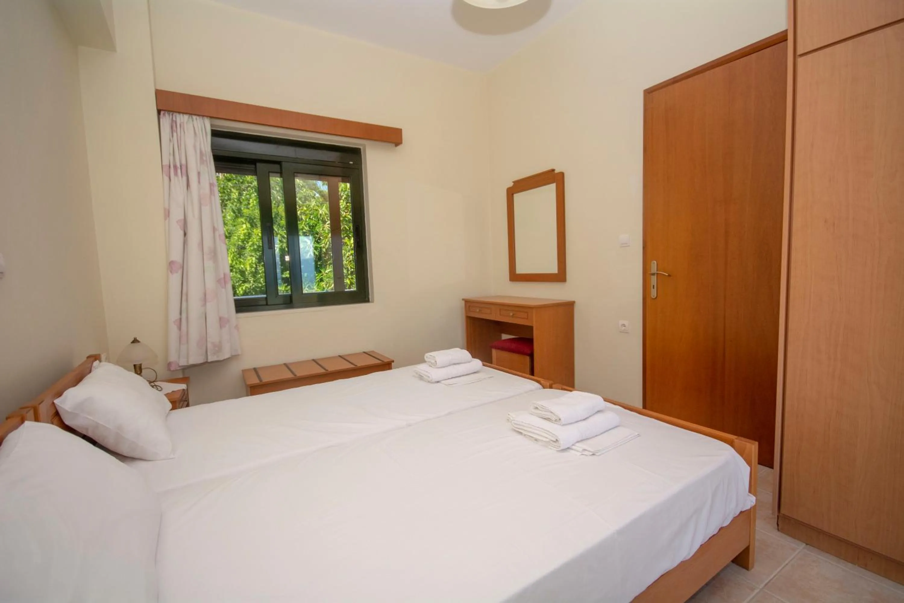 Bed in Xenios Zeus Apartments