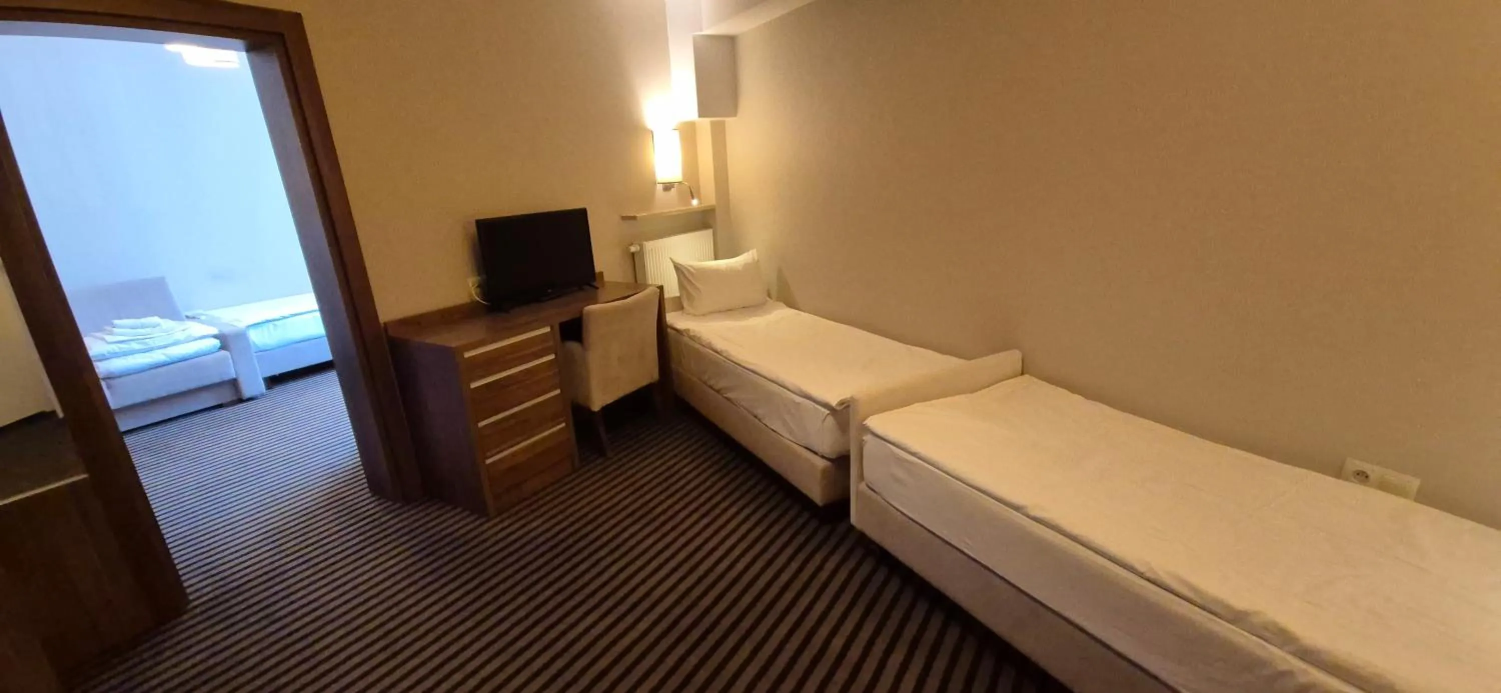 Property building, Bed in Hotel White