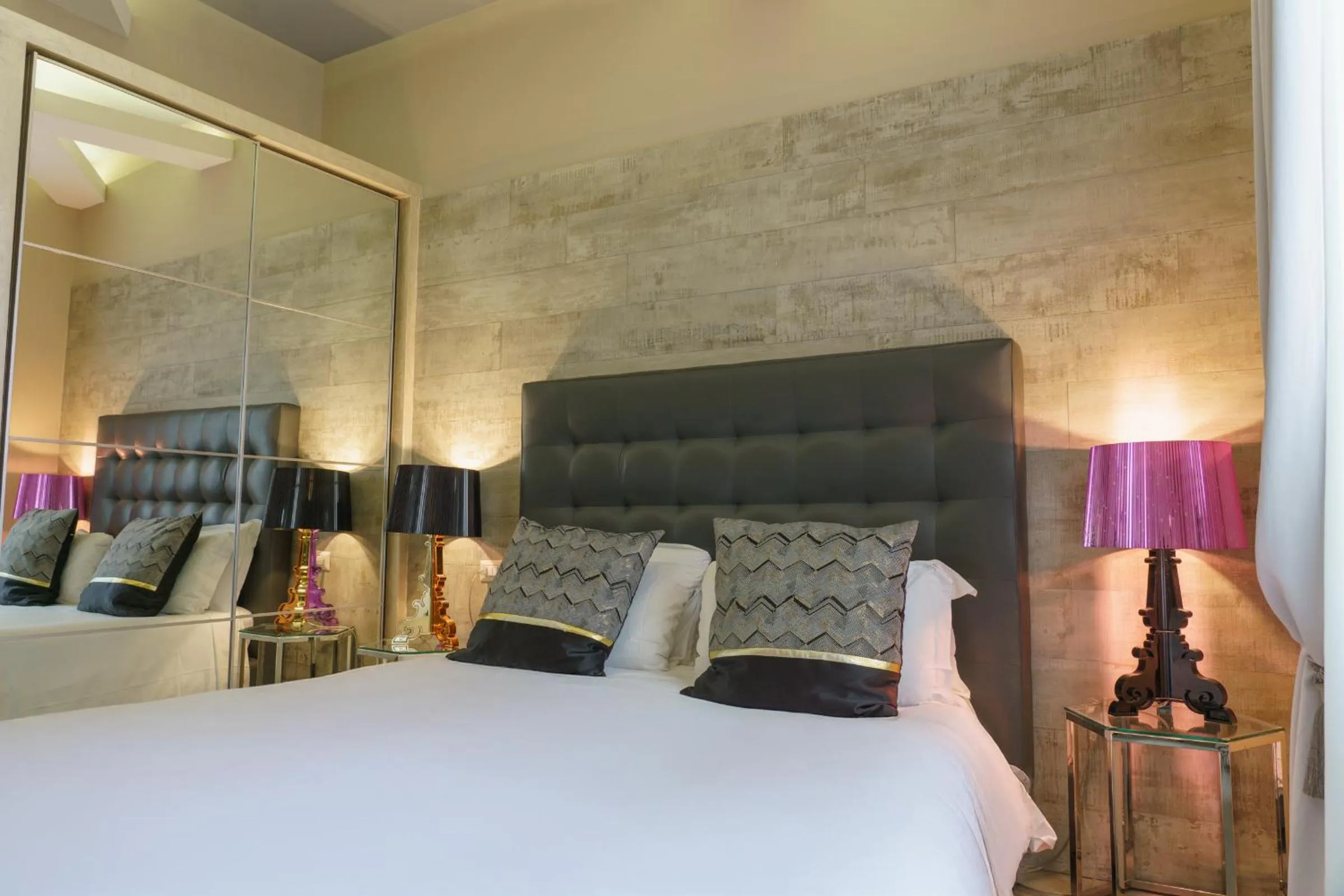 Bed in Corso Boutique Luxury Rooms