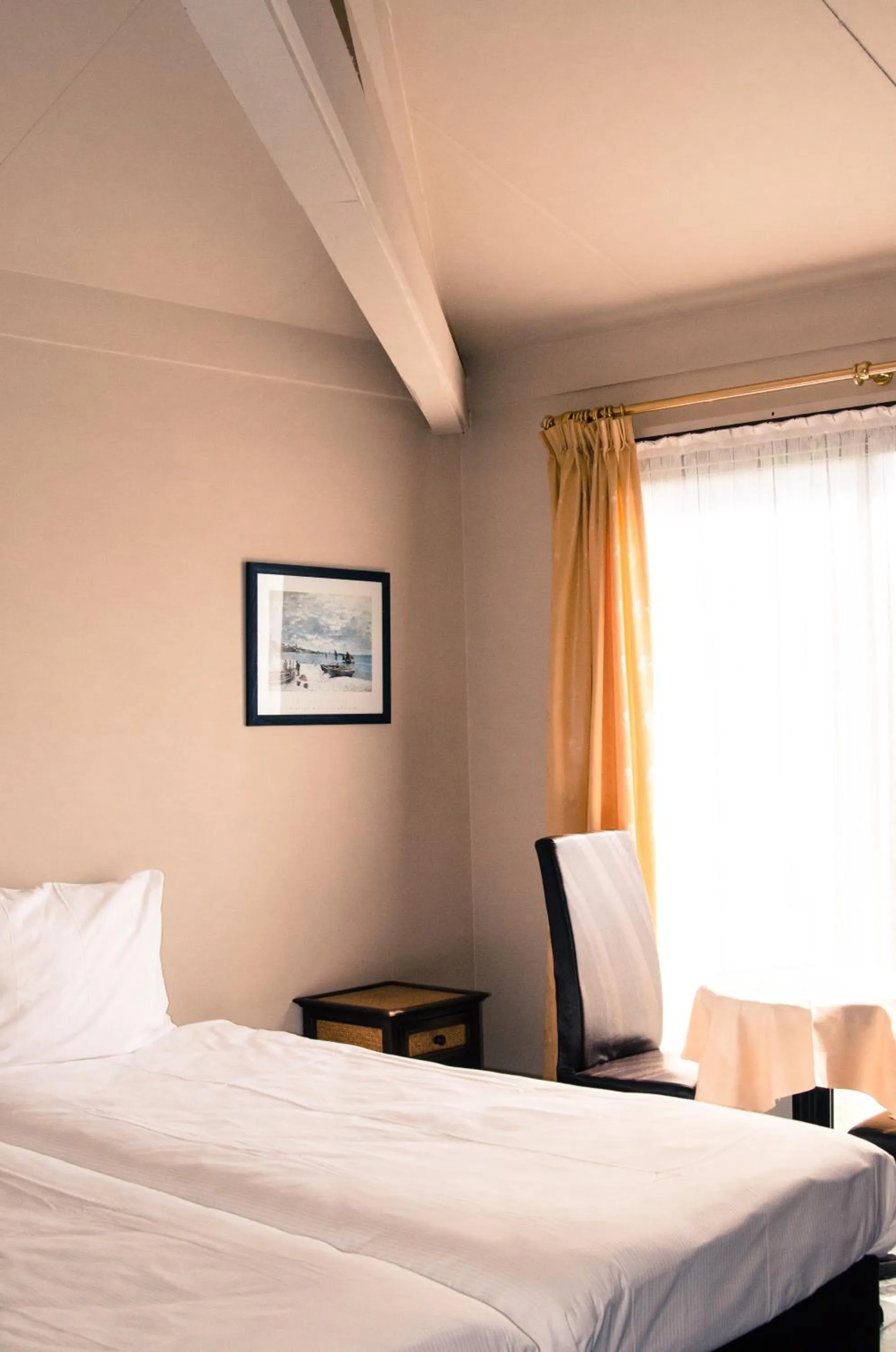 Bed in Hotel Pacific