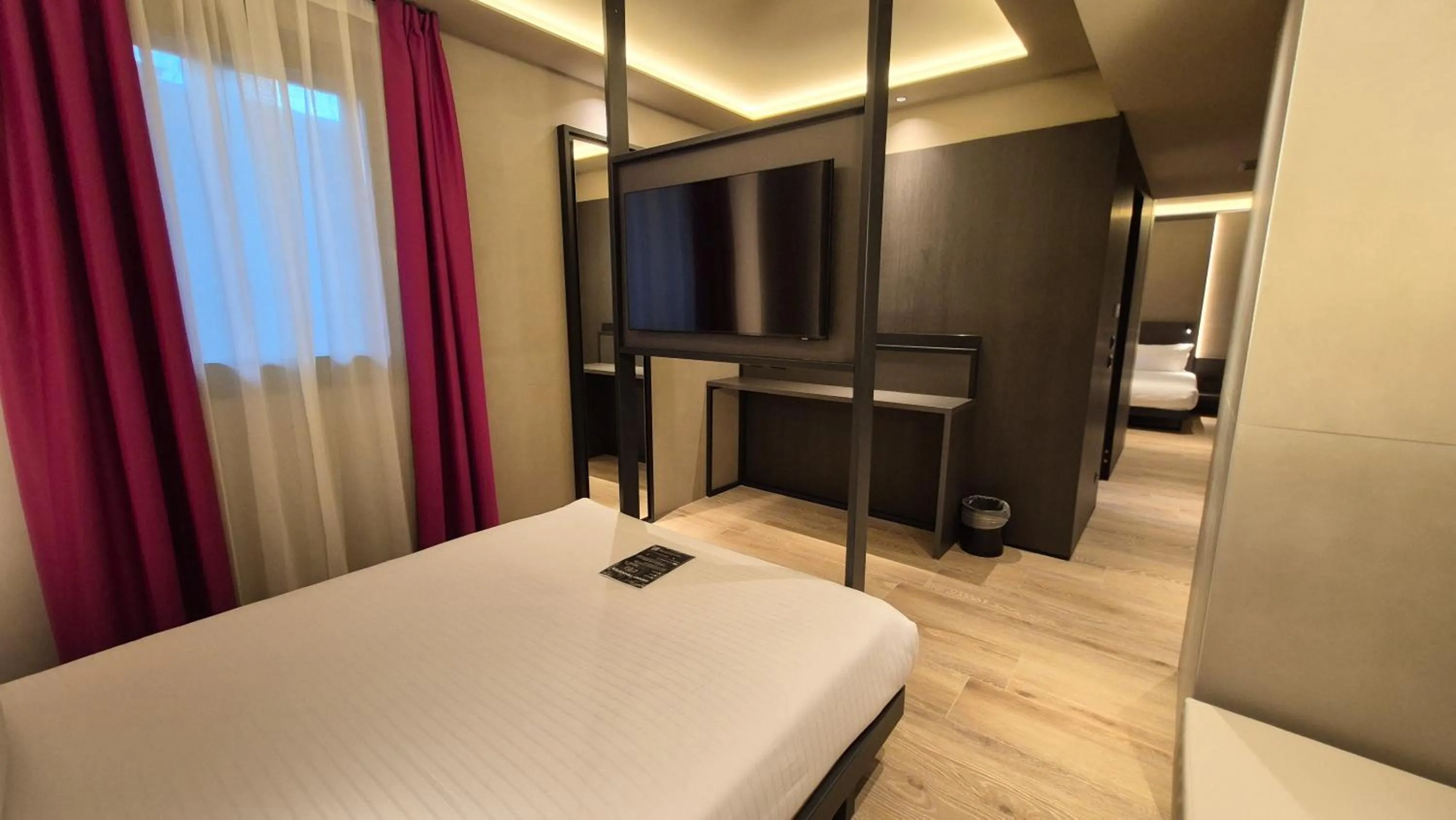 Bedroom, Bed in Kira Suites Hotel Milano