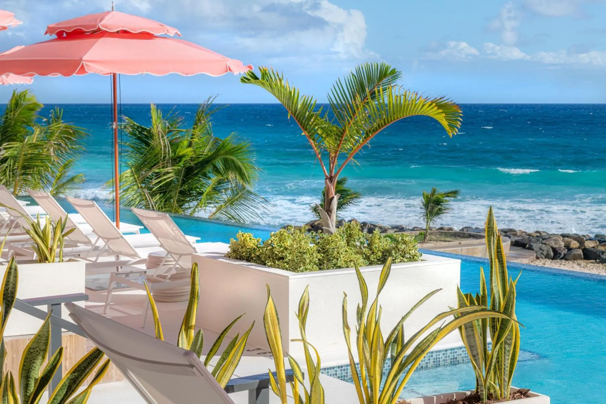 Swimming pool in Hotel Indigo Bridgetown Barbados by IHG