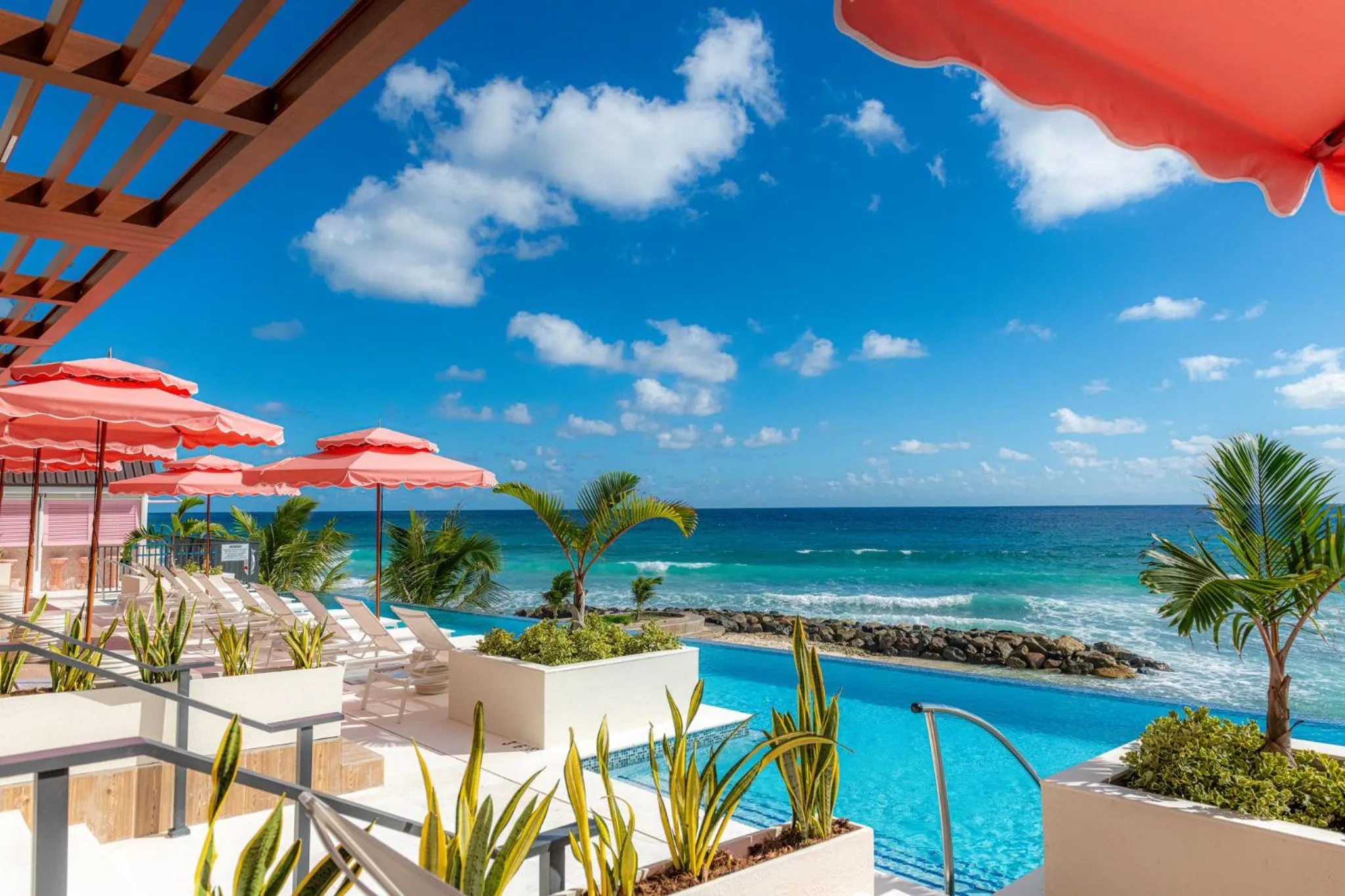 Swimming pool in Hotel Indigo Bridgetown Barbados by IHG