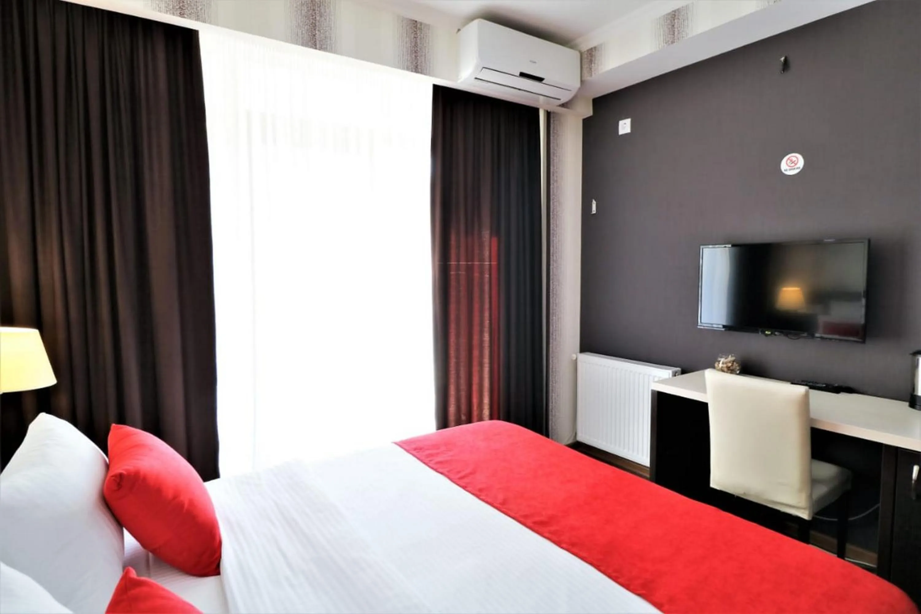 Photo of the whole room, Bed in East Gate Boutique Hotel