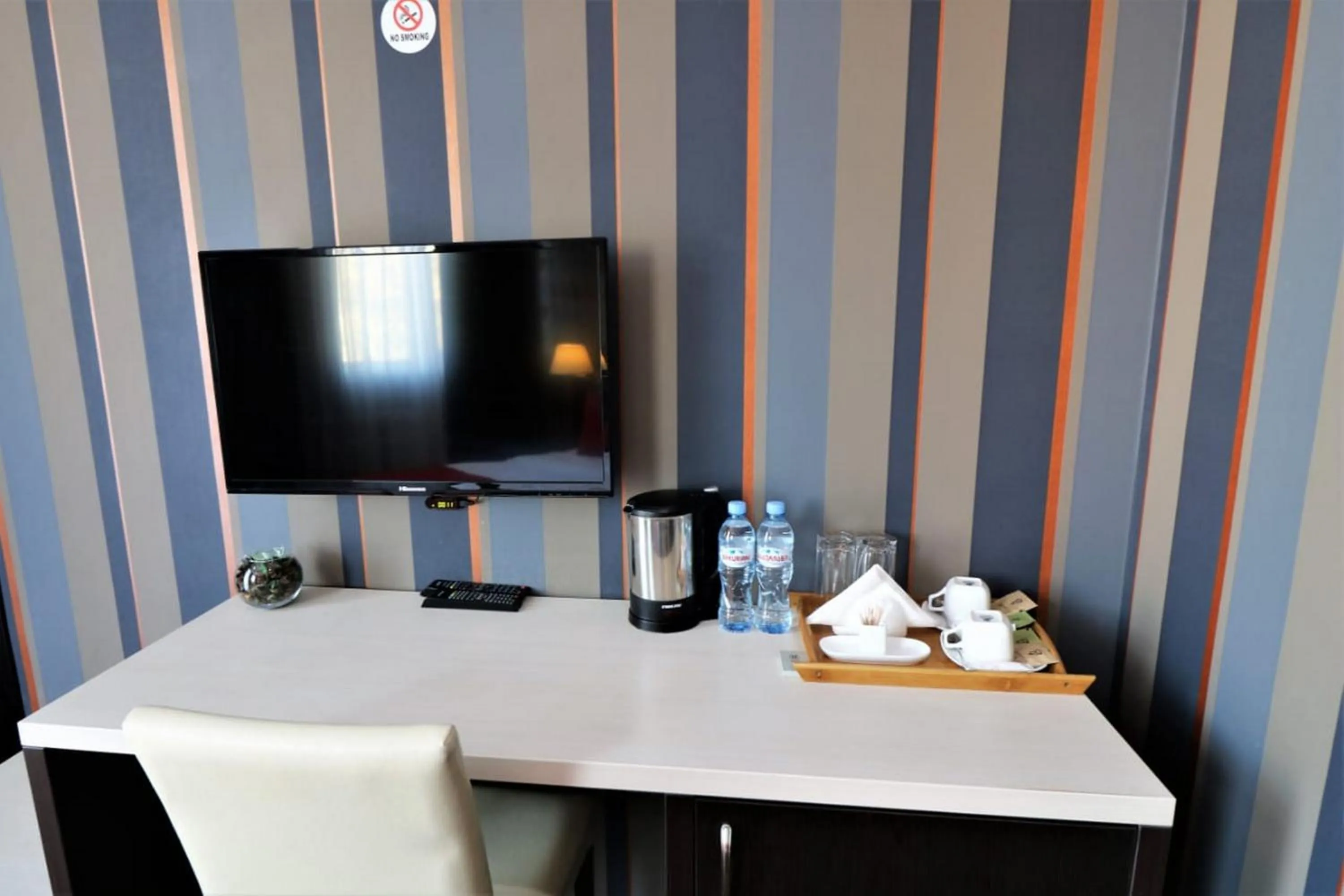 TV and multimedia in East Gate Boutique Hotel