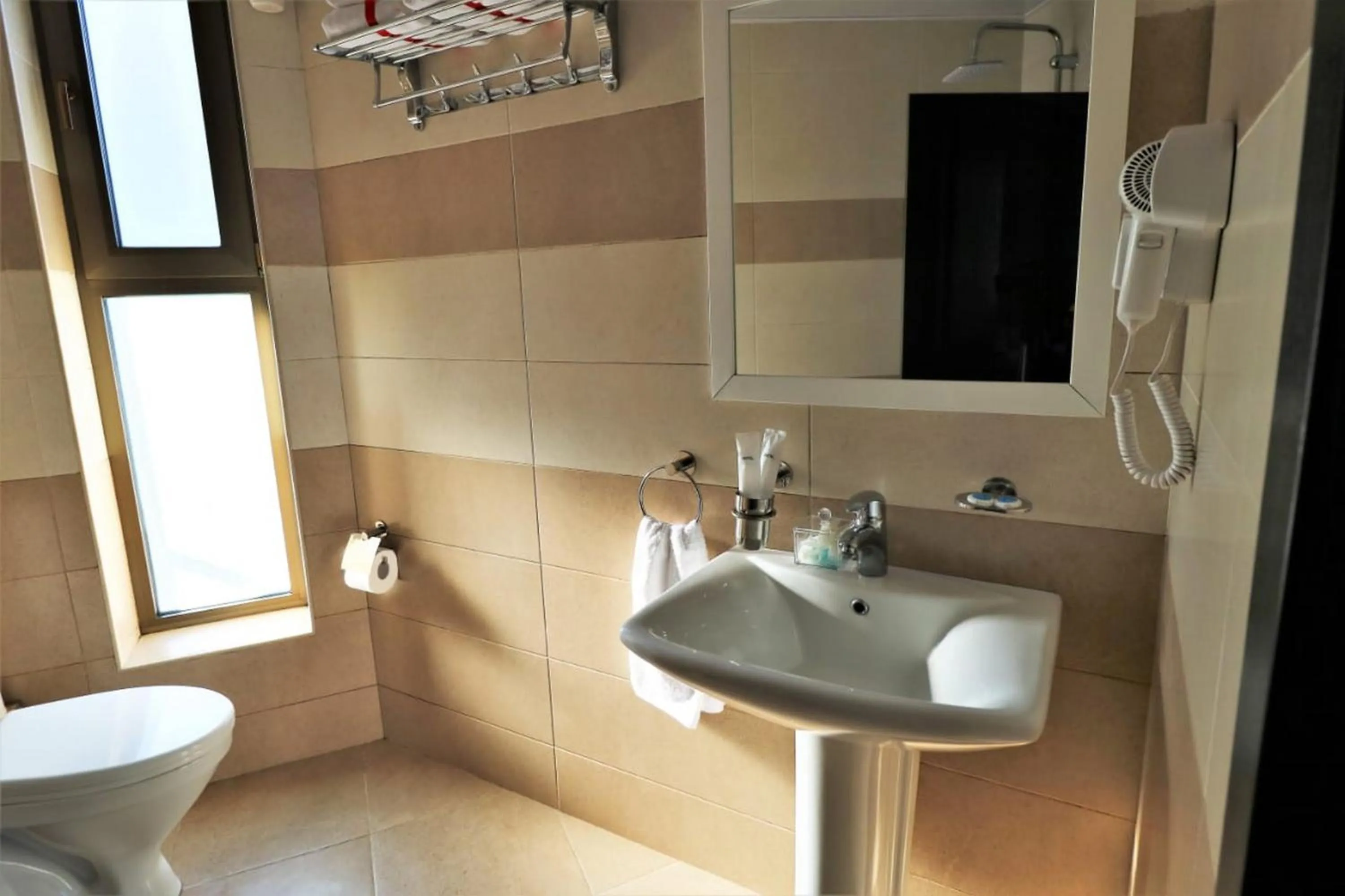 Toilet in East Gate Boutique Hotel