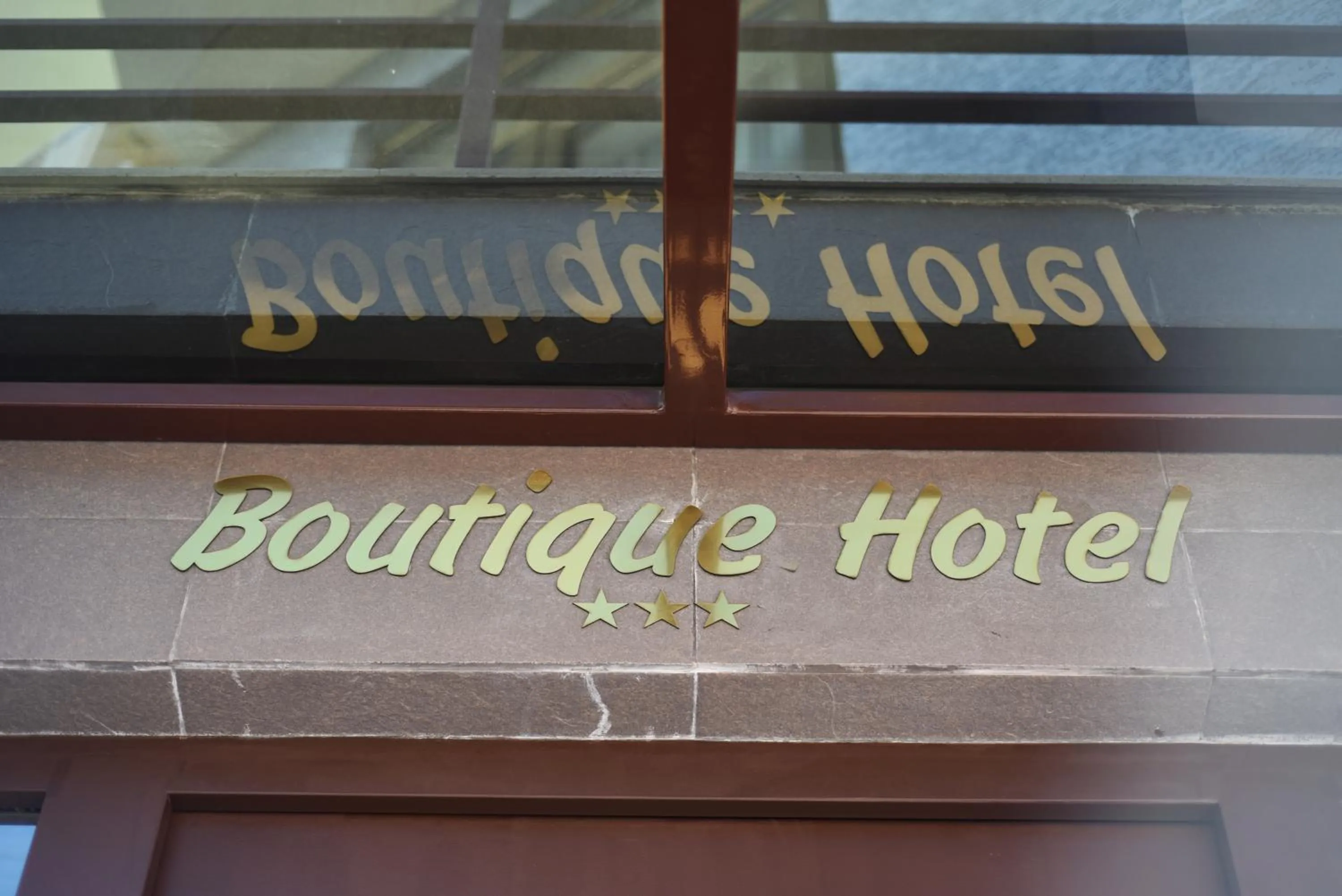 Property logo or sign in East Gate Boutique Hotel