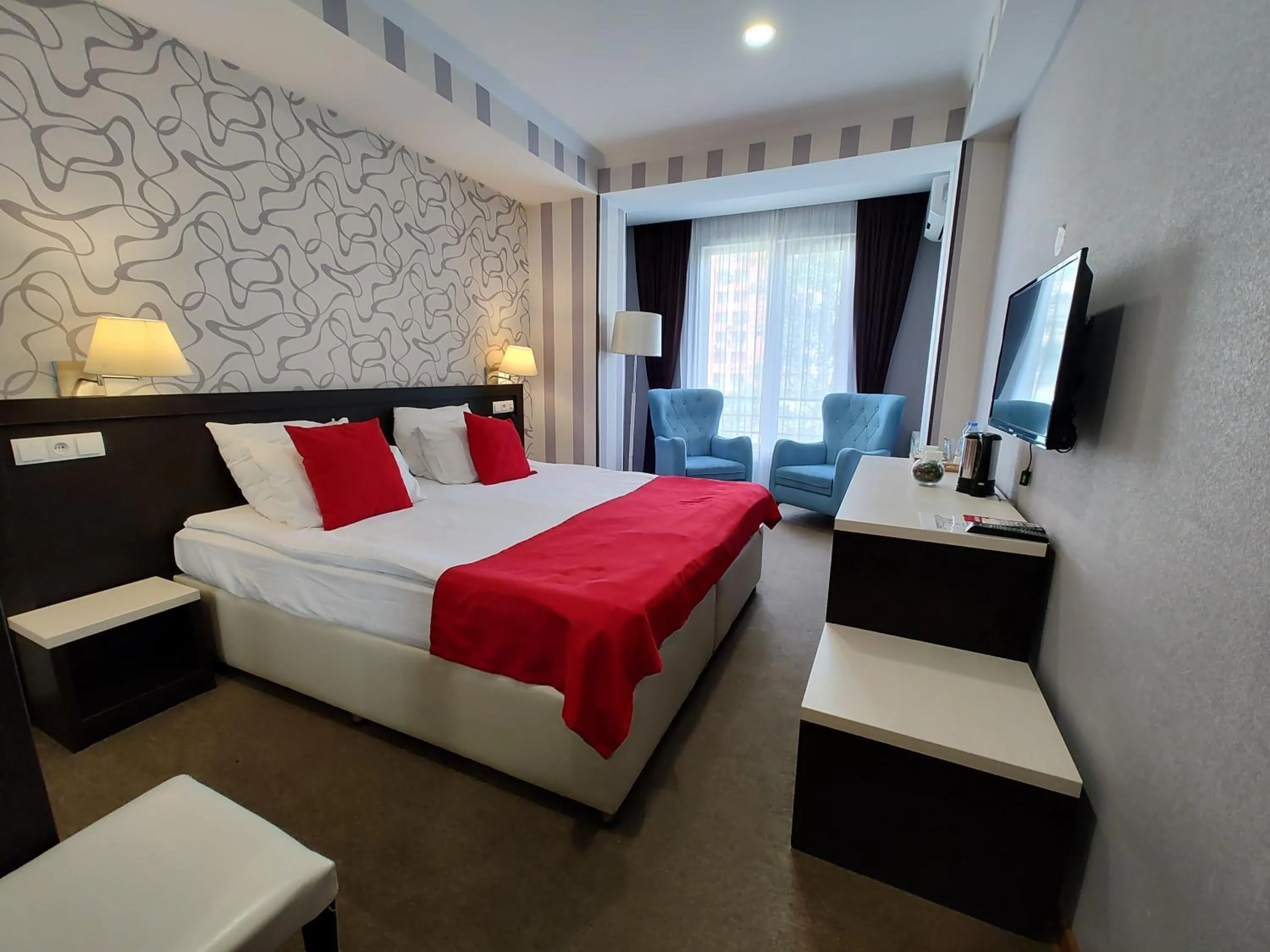 Photo of the whole room, Bed in East Gate Boutique Hotel