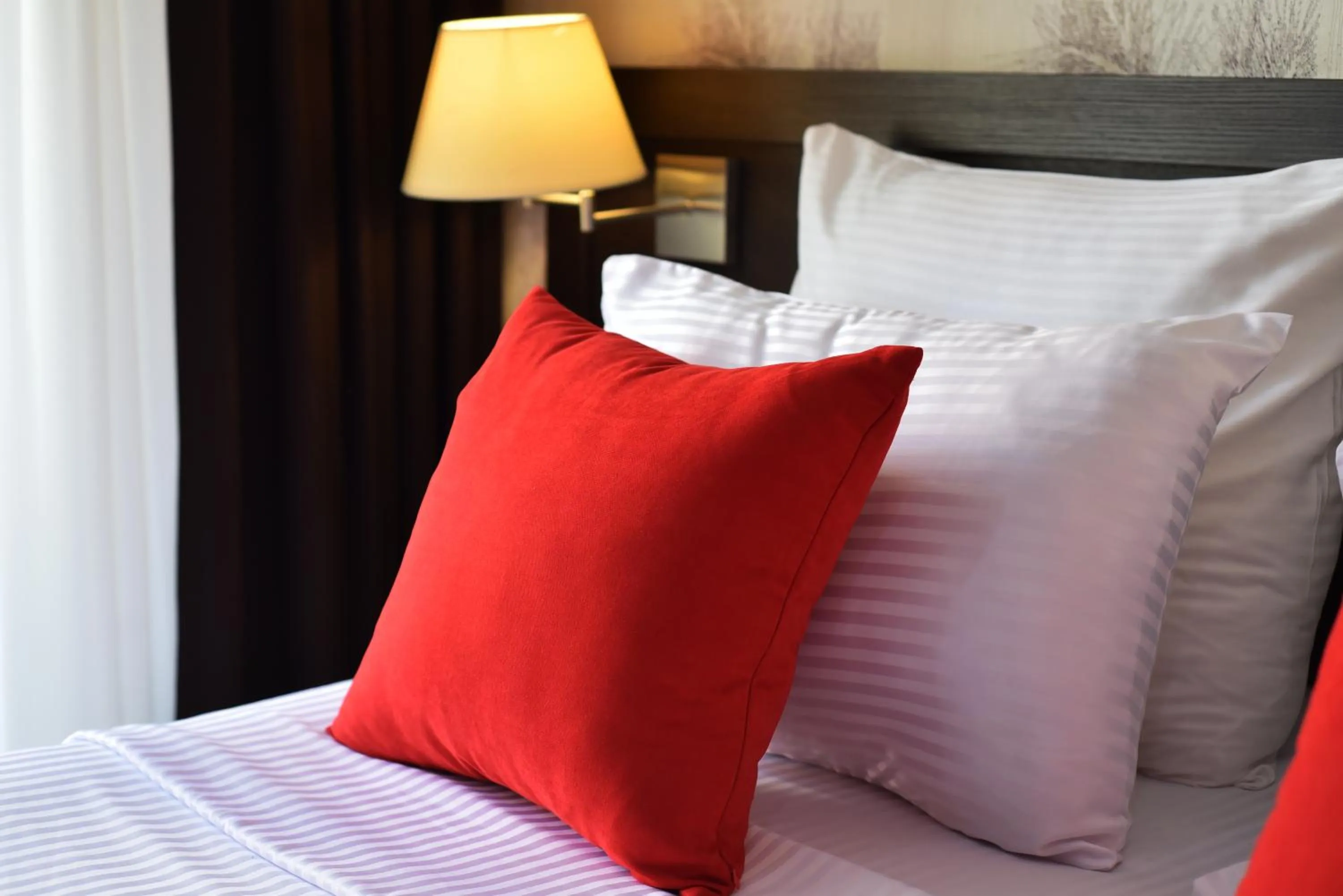 Bed in East Gate Boutique Hotel