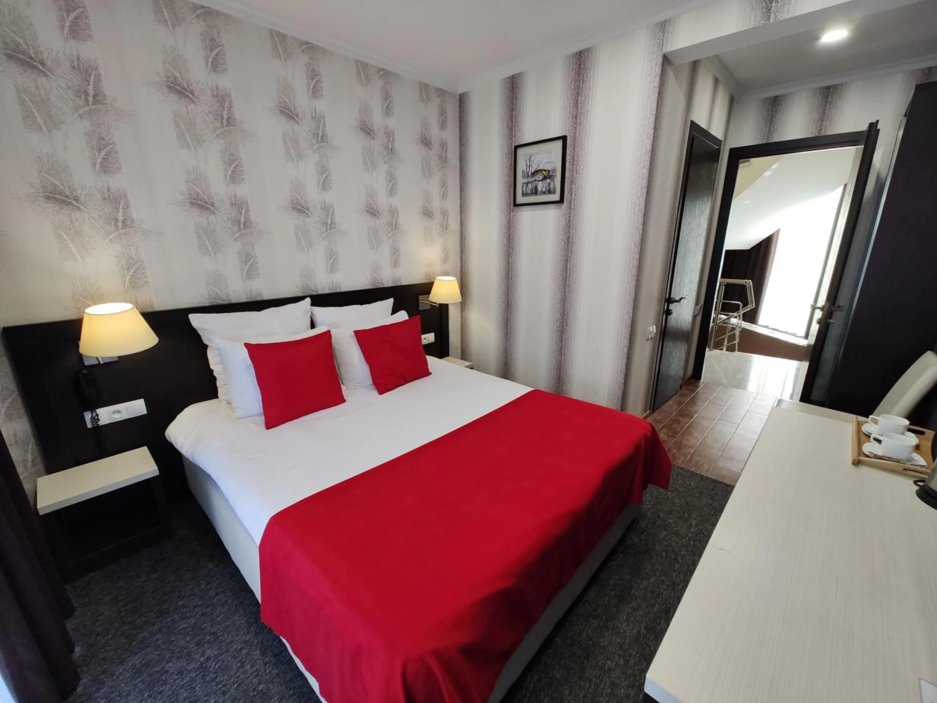 Photo of the whole room, Bed in East Gate Boutique Hotel