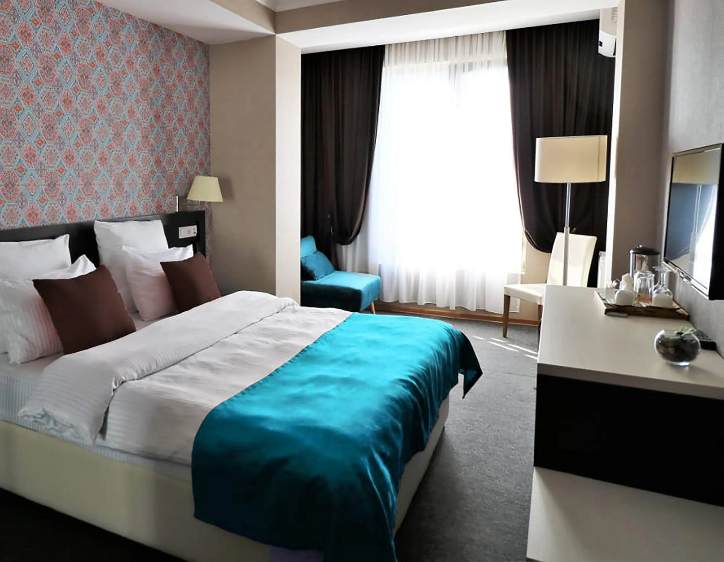 Bed in East Gate Boutique Hotel