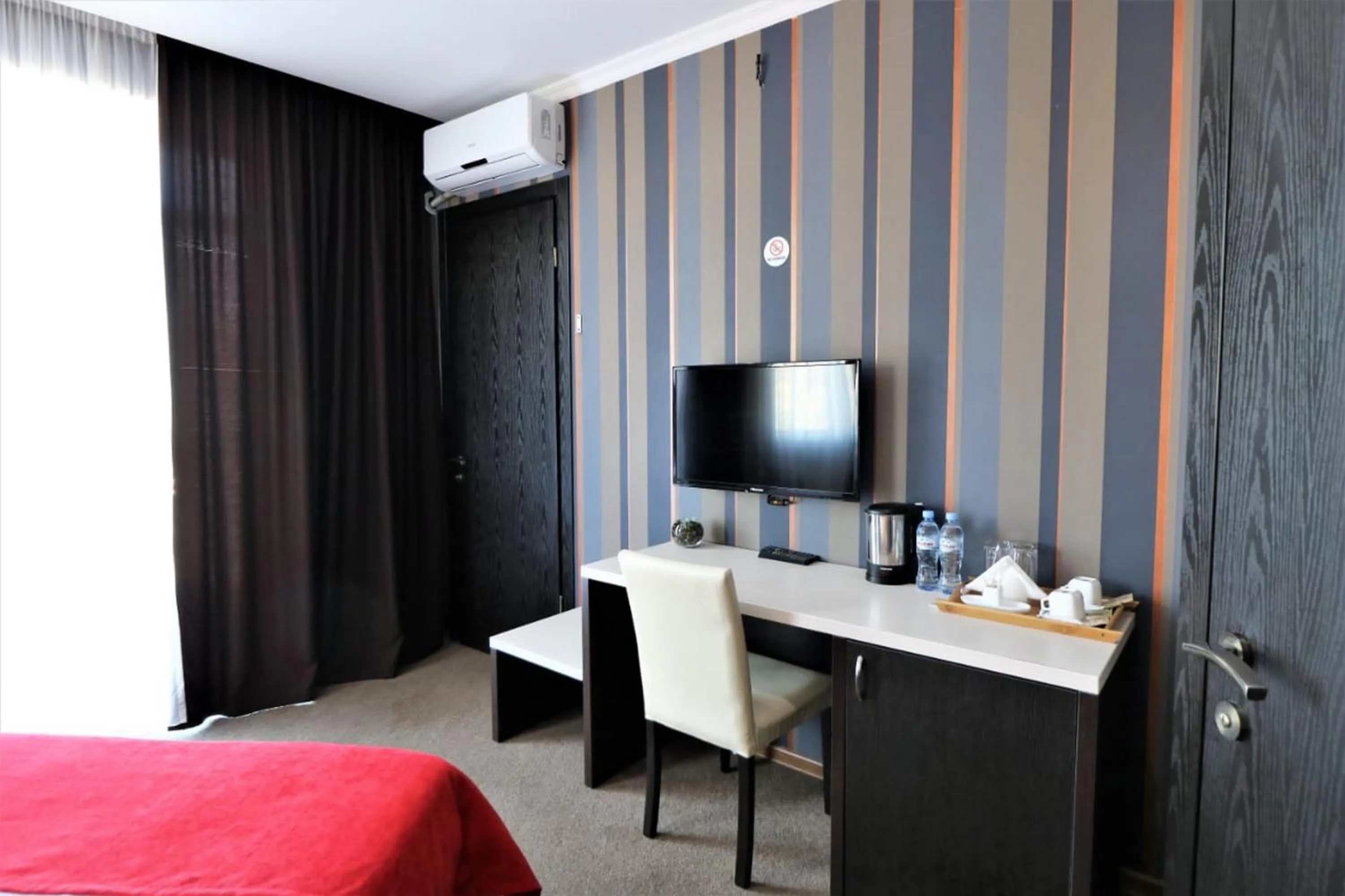 Photo of the whole room, Bed in East Gate Boutique Hotel