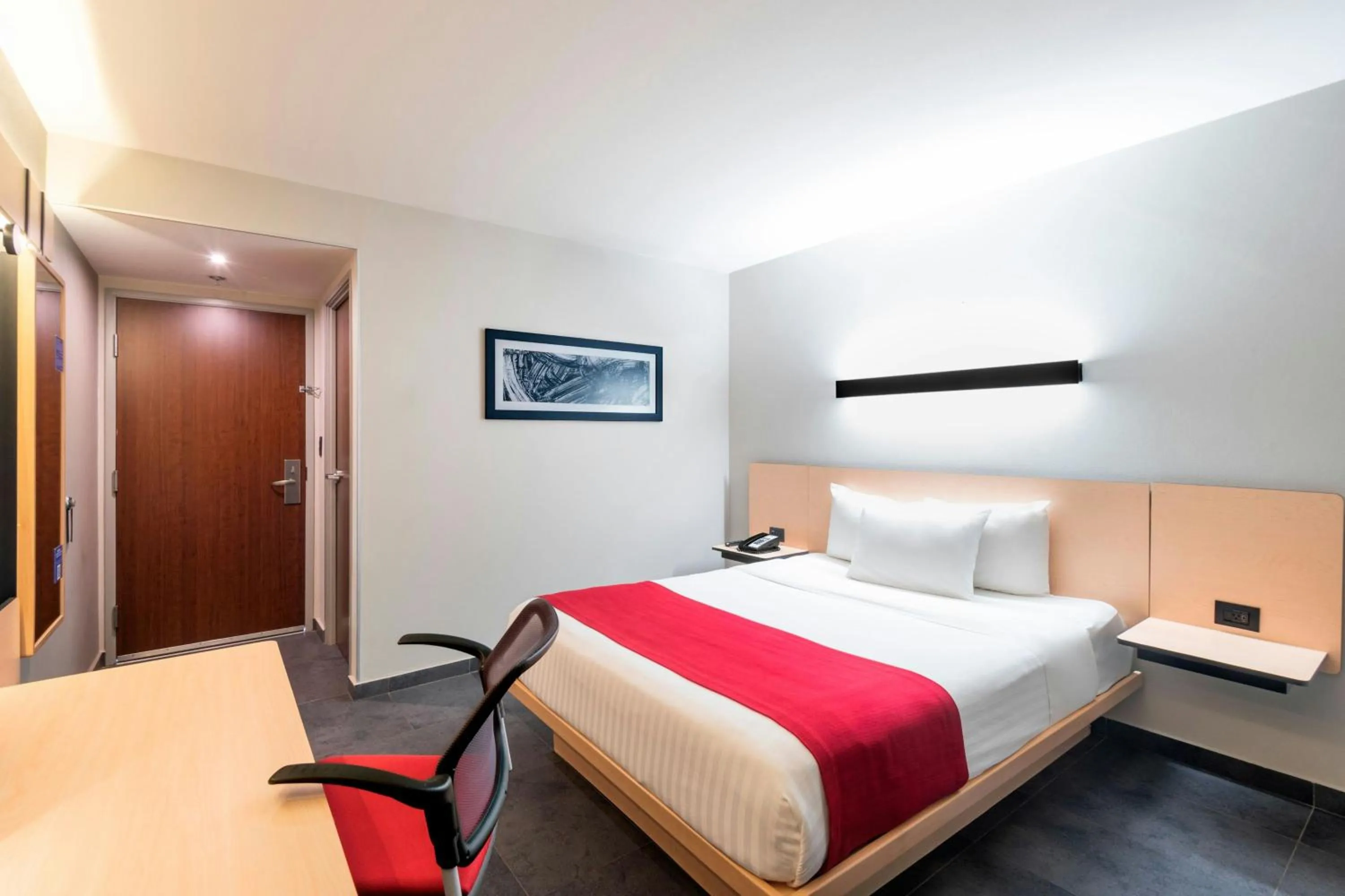 Photo of the whole room, Bed in City Express by Marriott Tuxpan